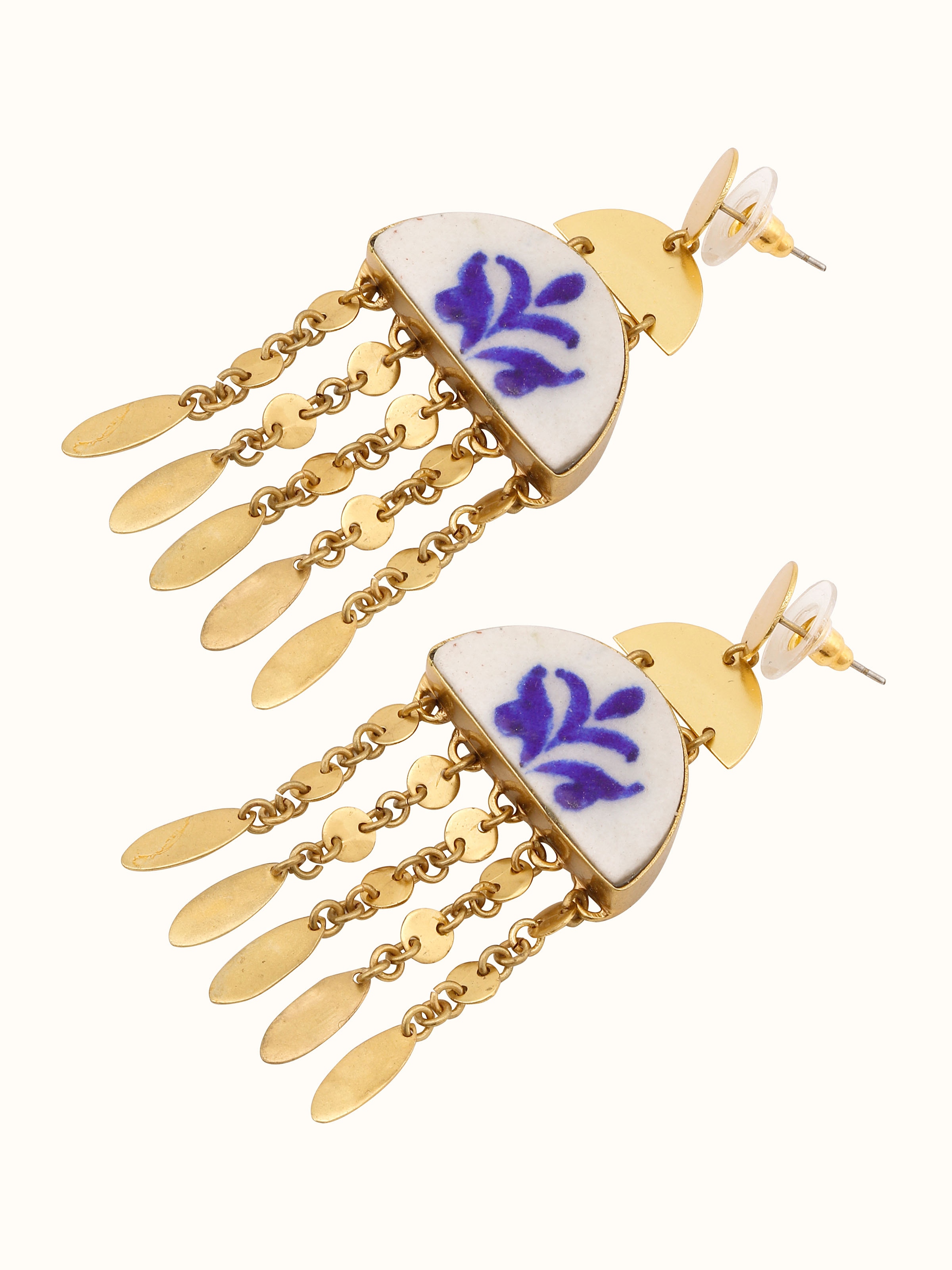 Detailed view of Blue Pottery drop earrings highlighting vibrant blue patterns and fine artistry