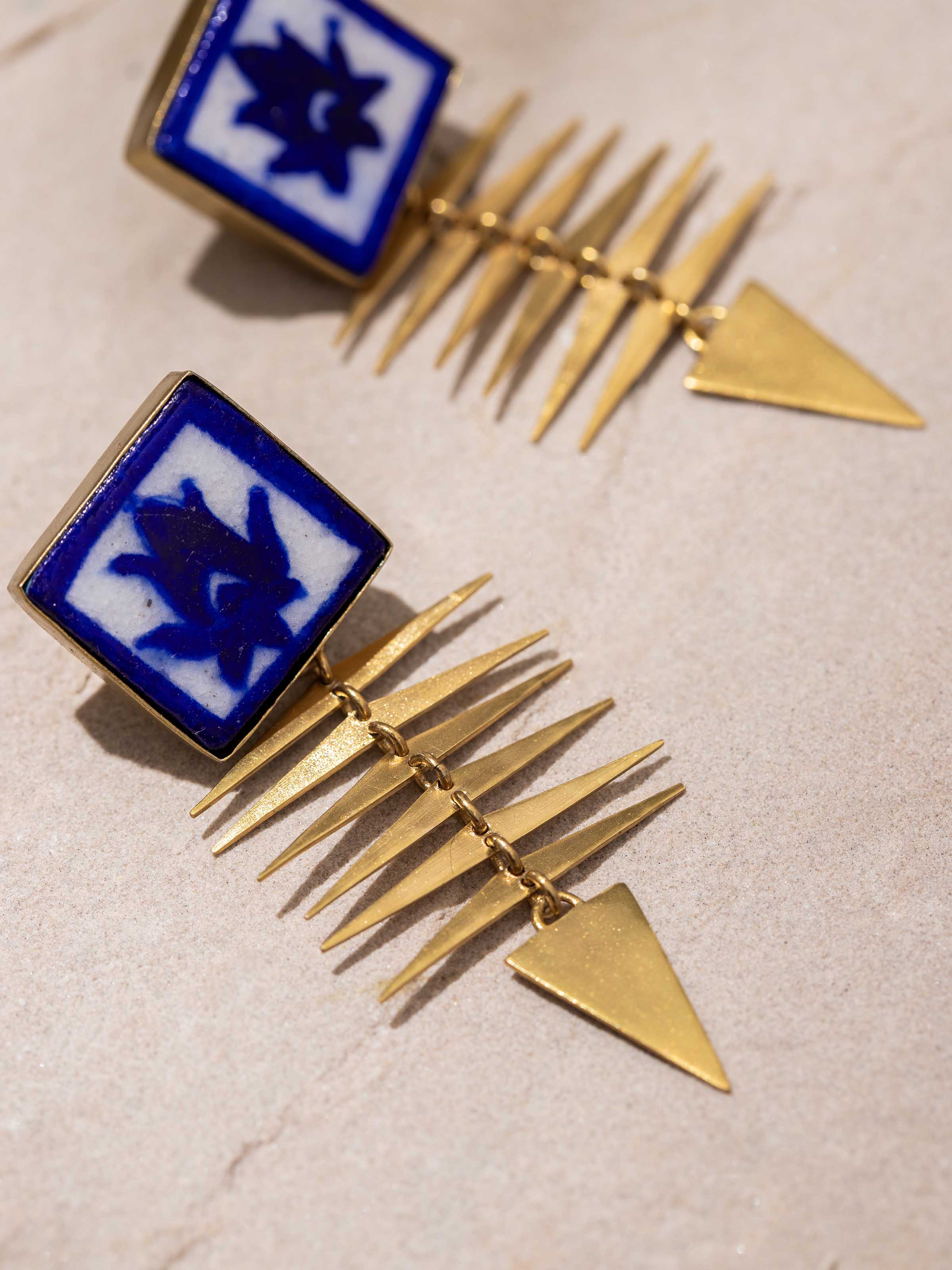 Back view of Blue Pottery Drop Earrings focusing on the secure clasp and overall design.