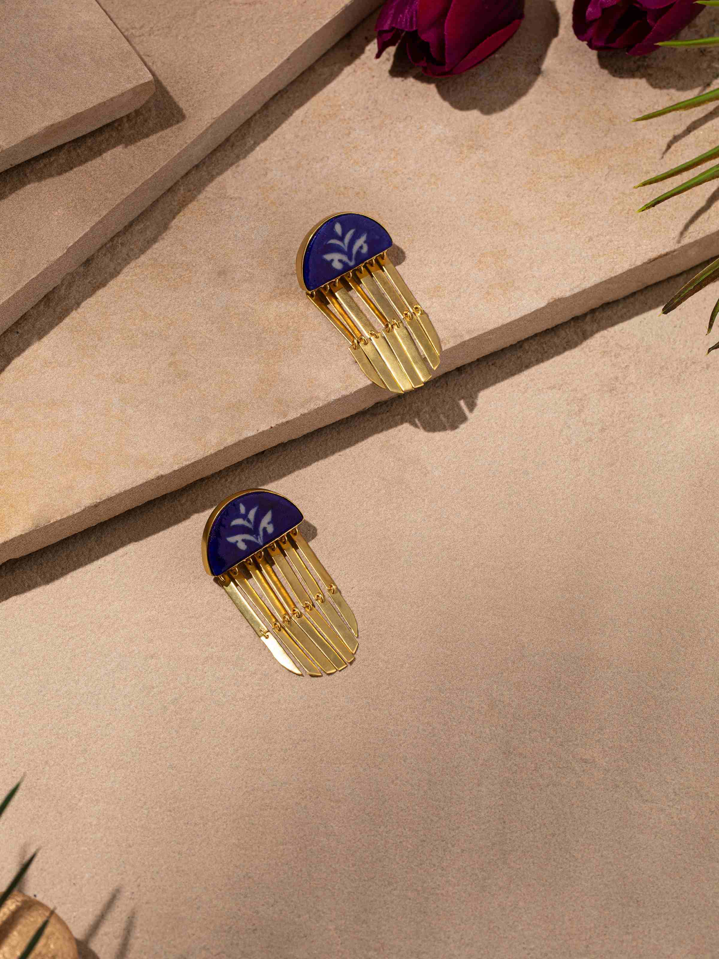 Close-up view of Blue Pottery Drop Earrings featuring the intricate blue pottery pattern and fine detailing.