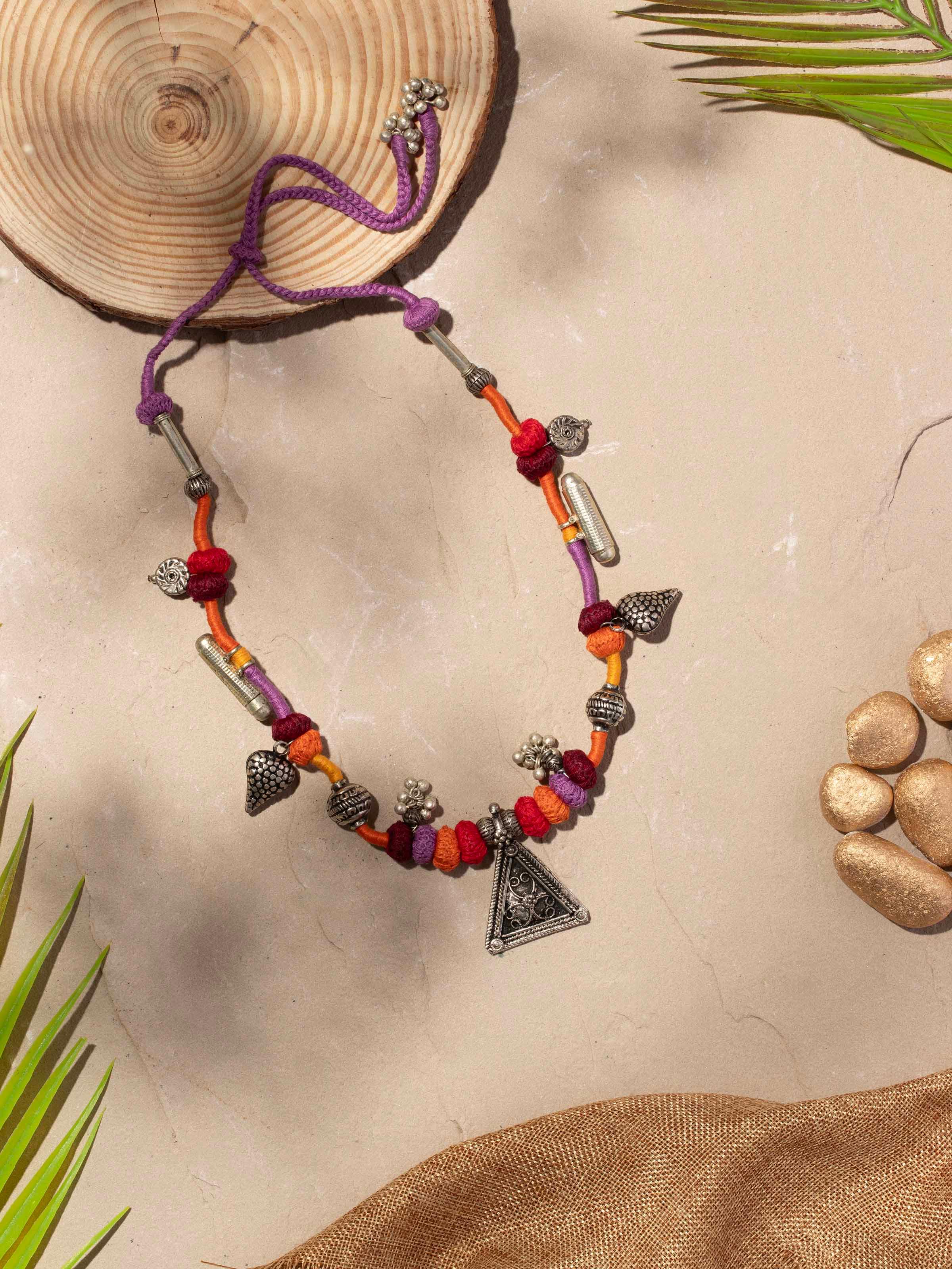 Angled view of Lambani Collar Necklace showcasing traditional craftsmanship and beadwork.