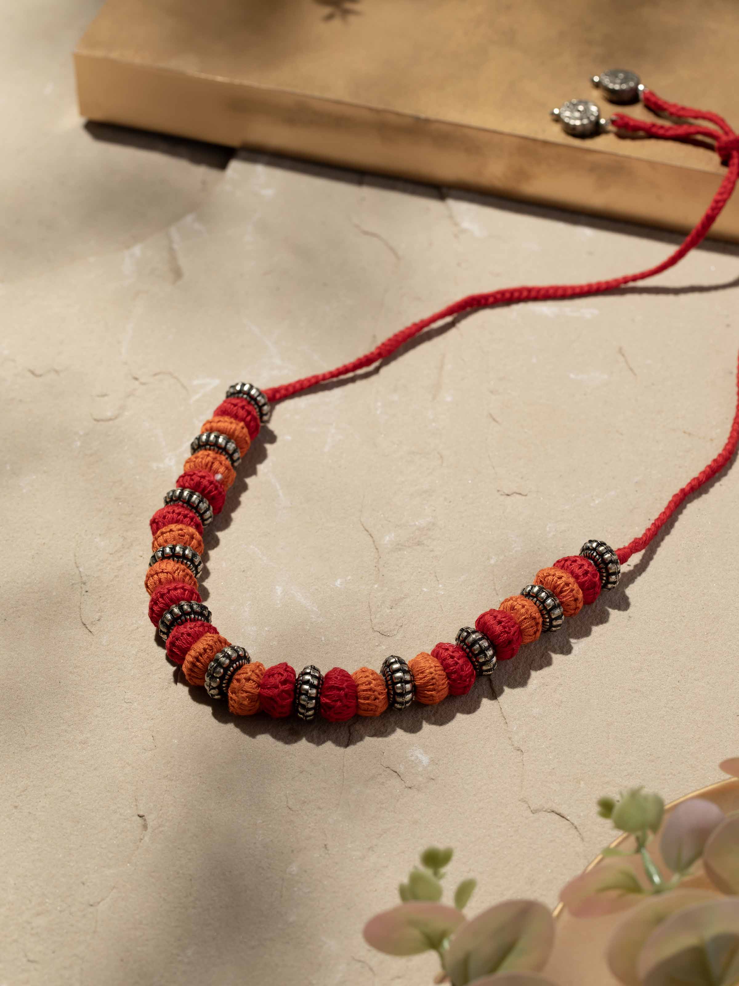 Side view of Lambani collar necklace showcasing the detailed beadwork and craftsmanship.