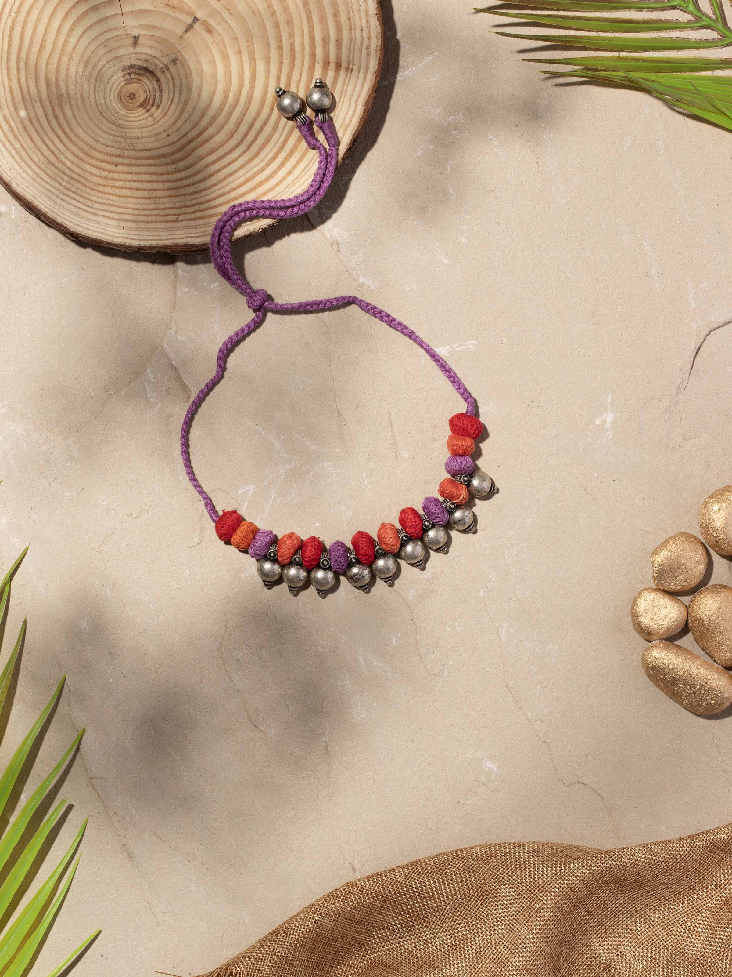 Side view of Lambani Collar Necklace showcasing its unique design and craftsmanship.