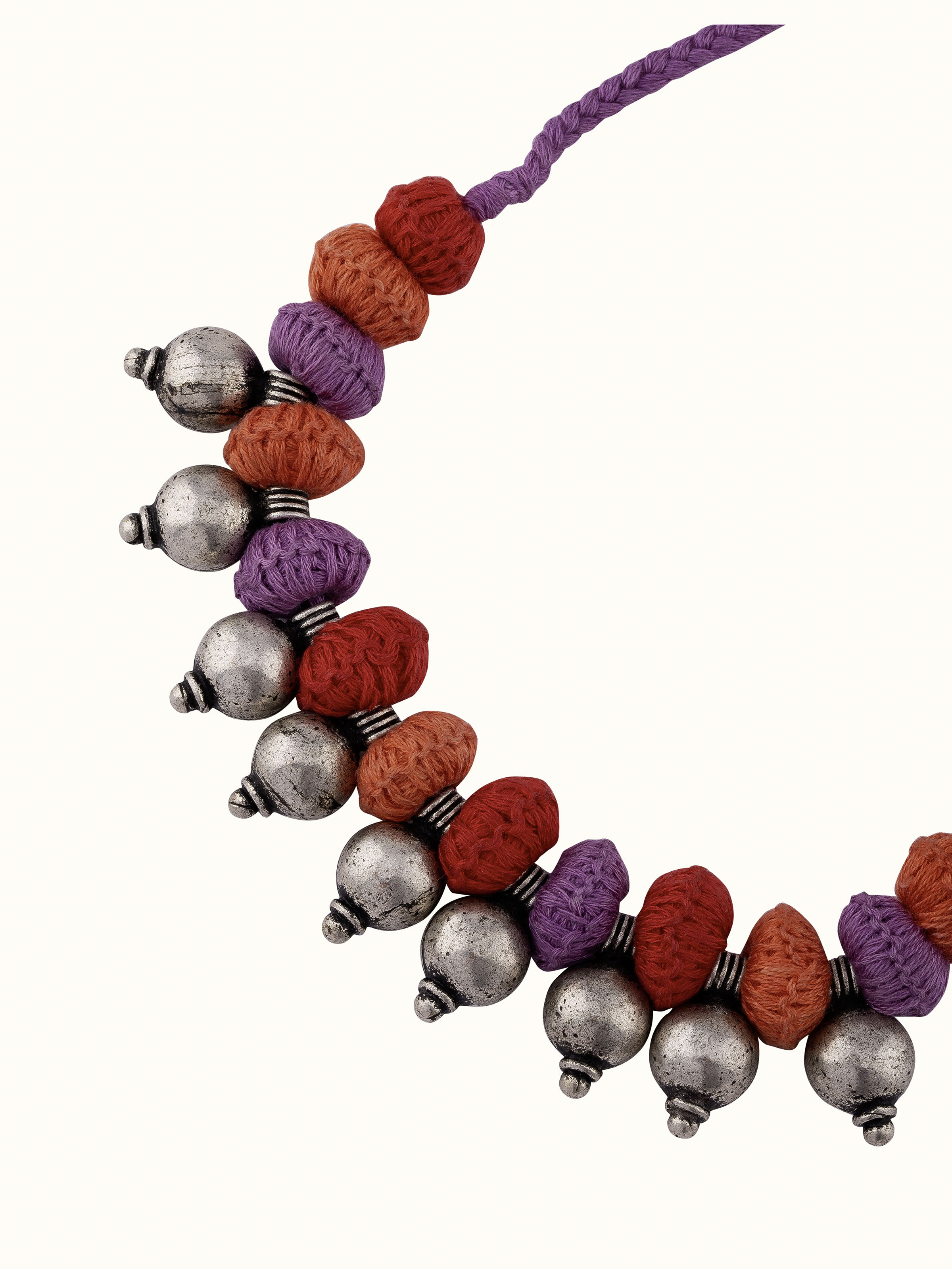 Angled view of Lambani Collar Necklace emphasizing its traditional embroidery.