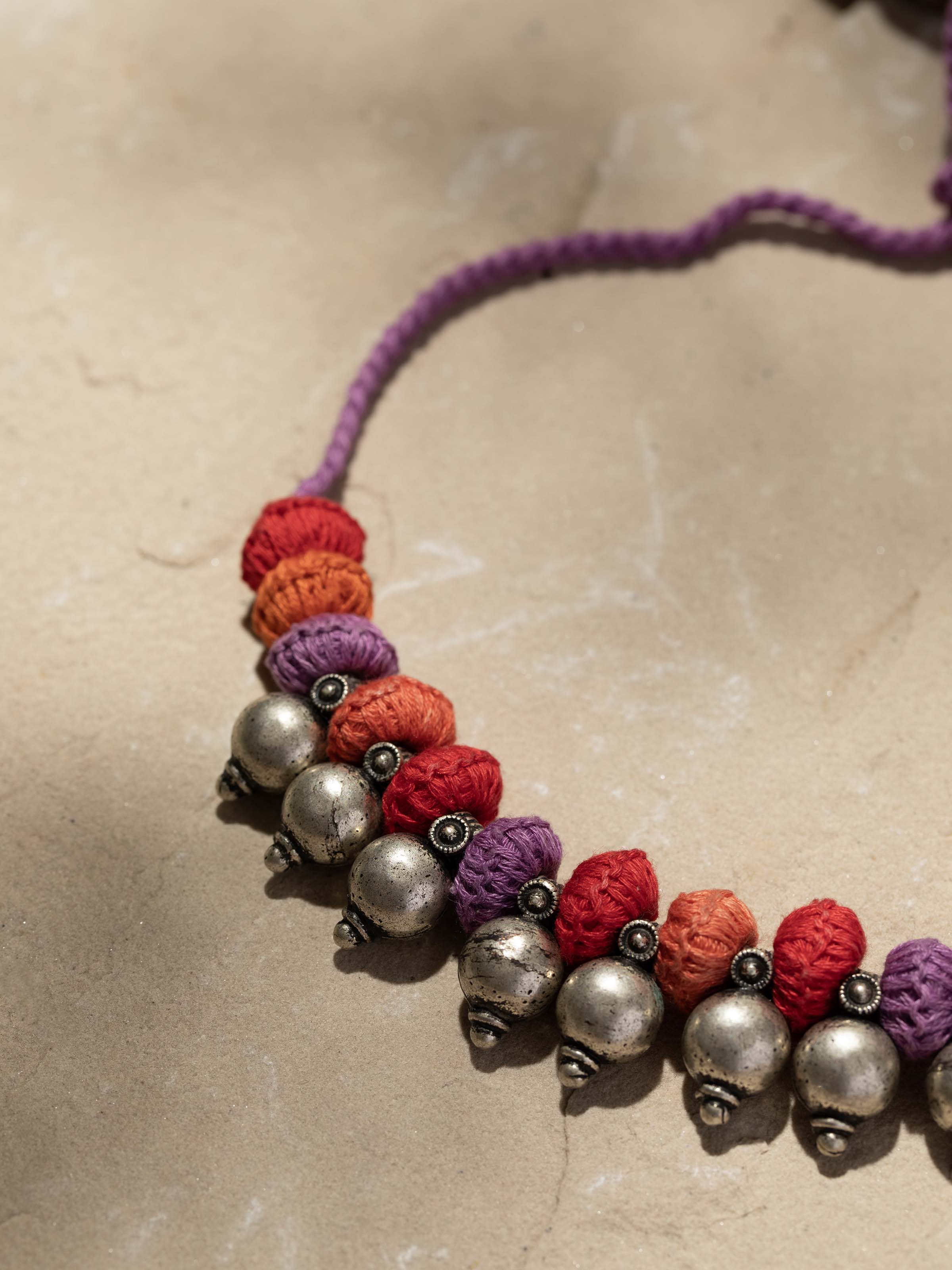 Back view of Lambani Collar Necklace showcasing clasp and design details.