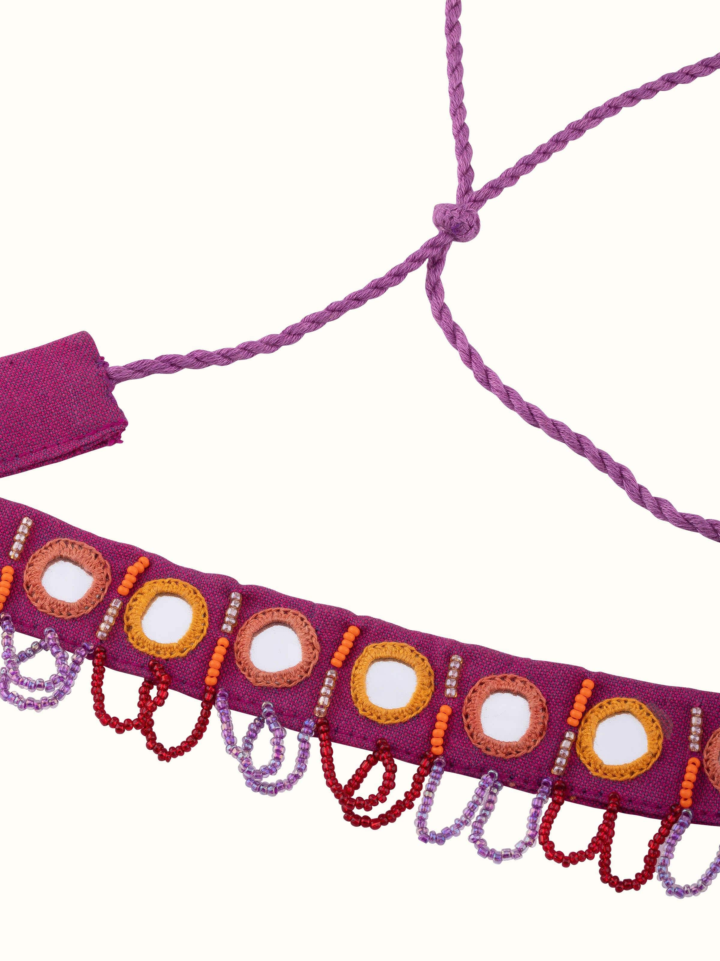 Angled view of Lambani Choker displaying its colorful patterns and detailed beadwork.