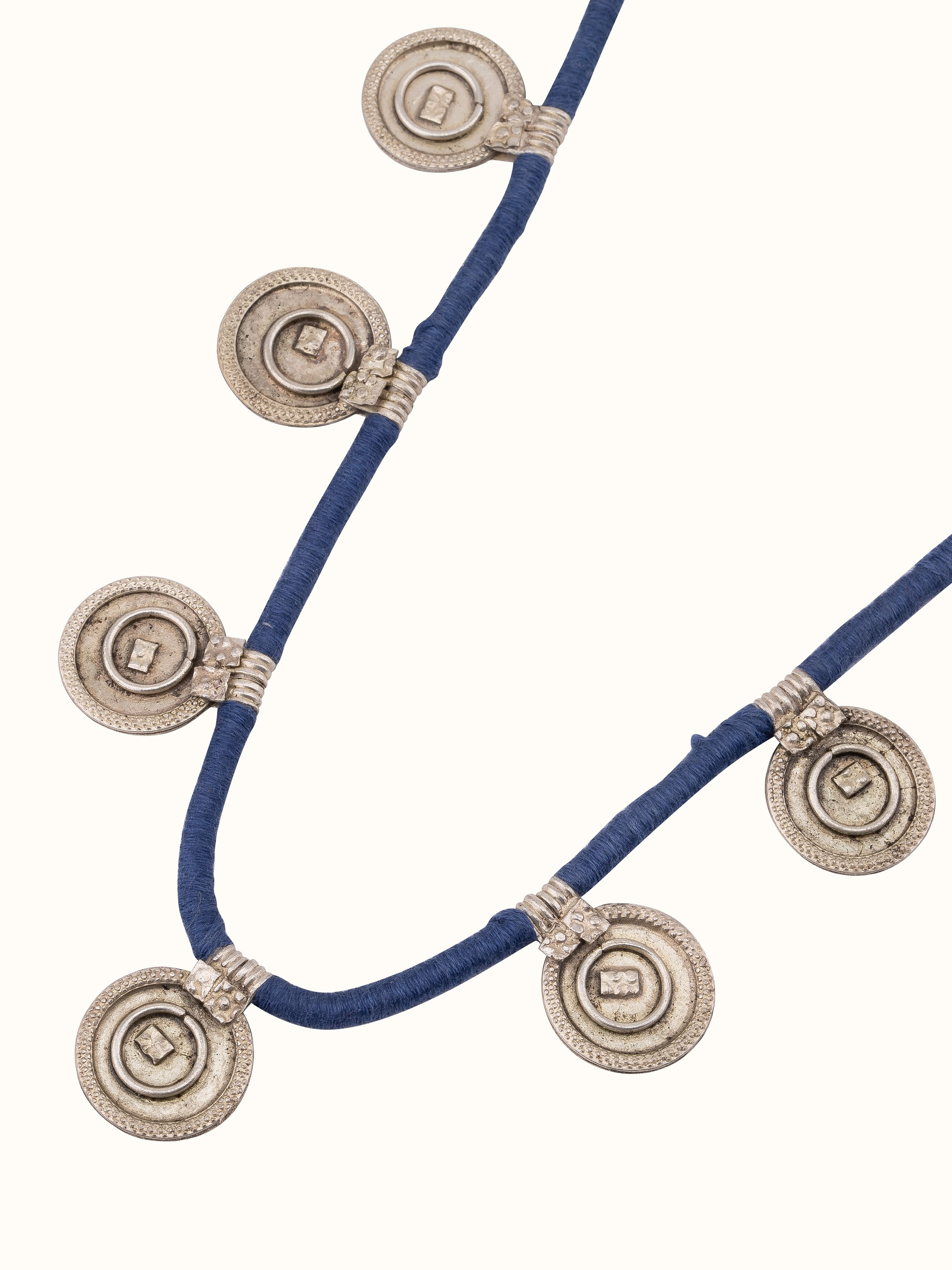 Angled view of Lambani long necklace focusing on intricate beadwork and overall design