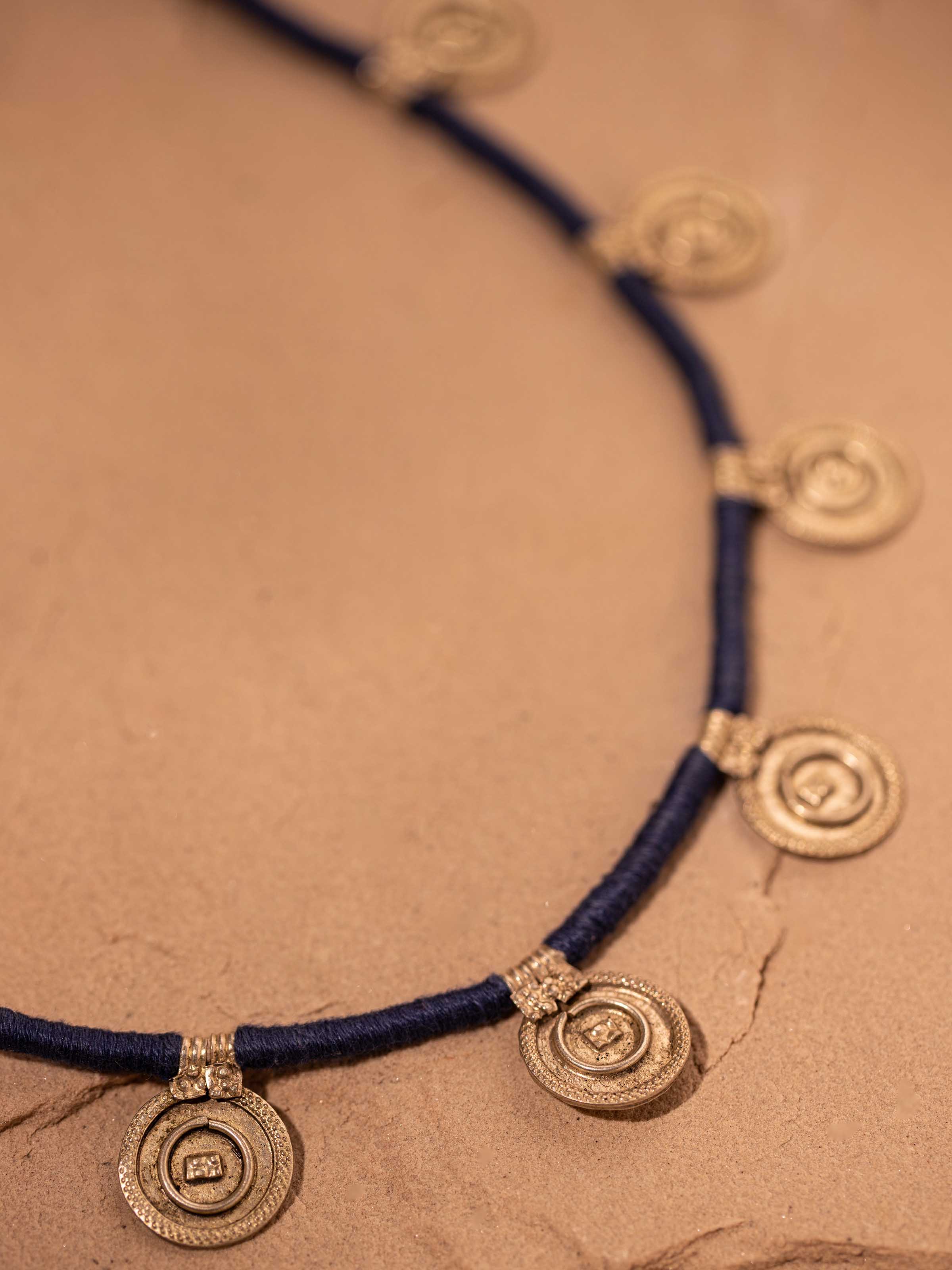 Detailed close-up of Lambani long necklace showcasing intricate details and craftsmanship