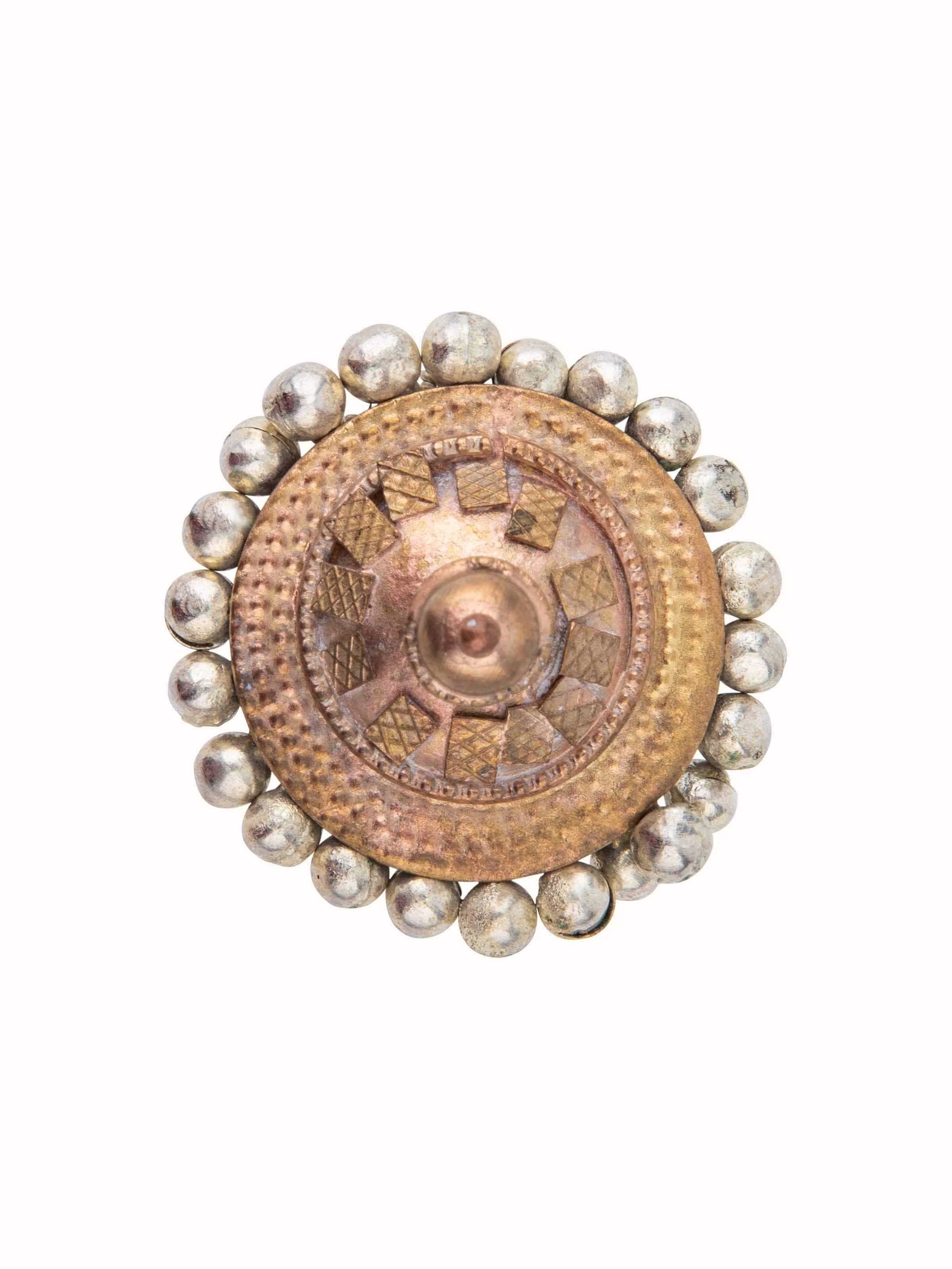 Front view of Lambani Ring featuring traditional design and intricate metalwork with colorful accents.