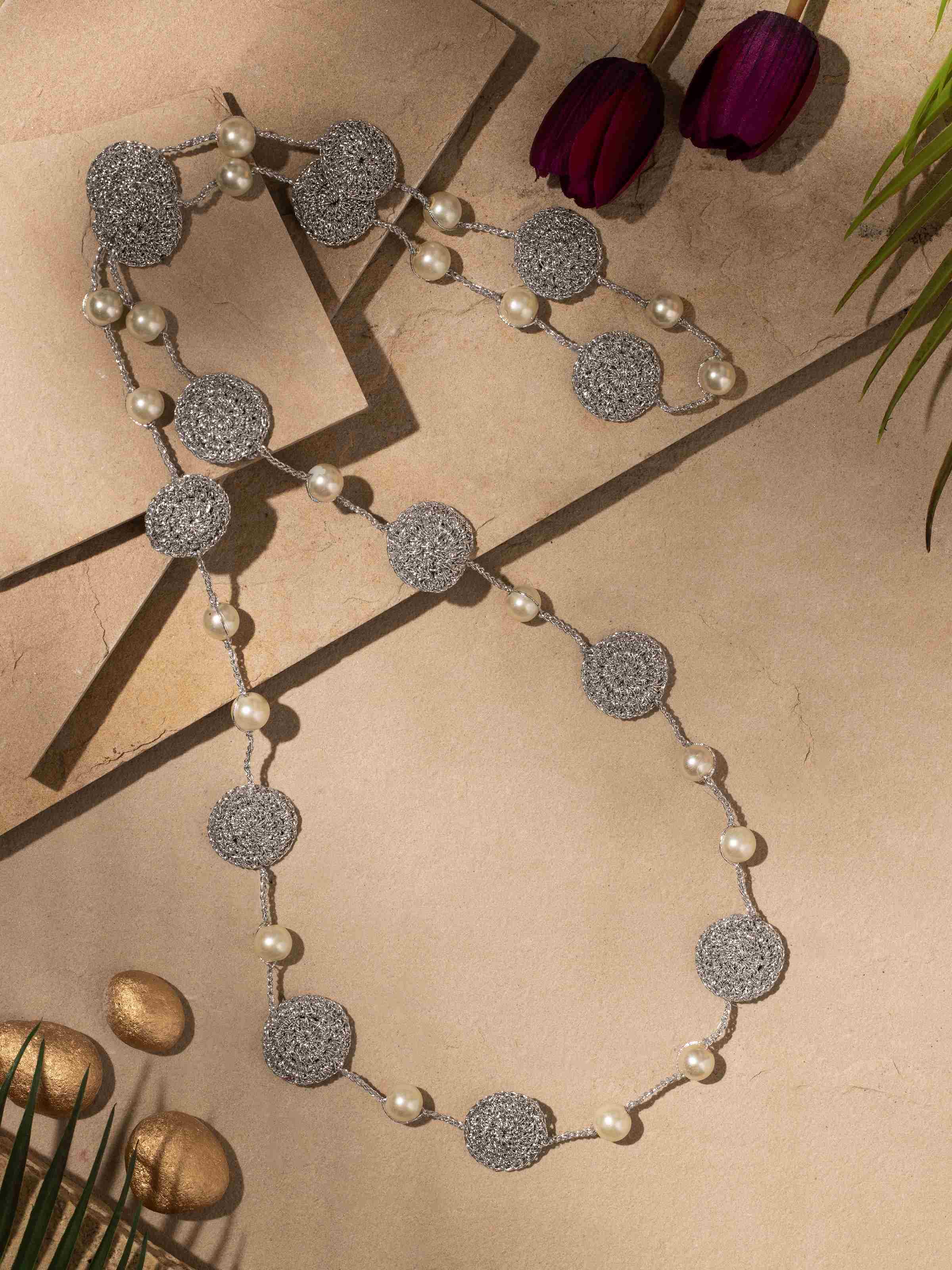 Close-up view of Crochet Long Necklace focusing on detailed crochet pattern.