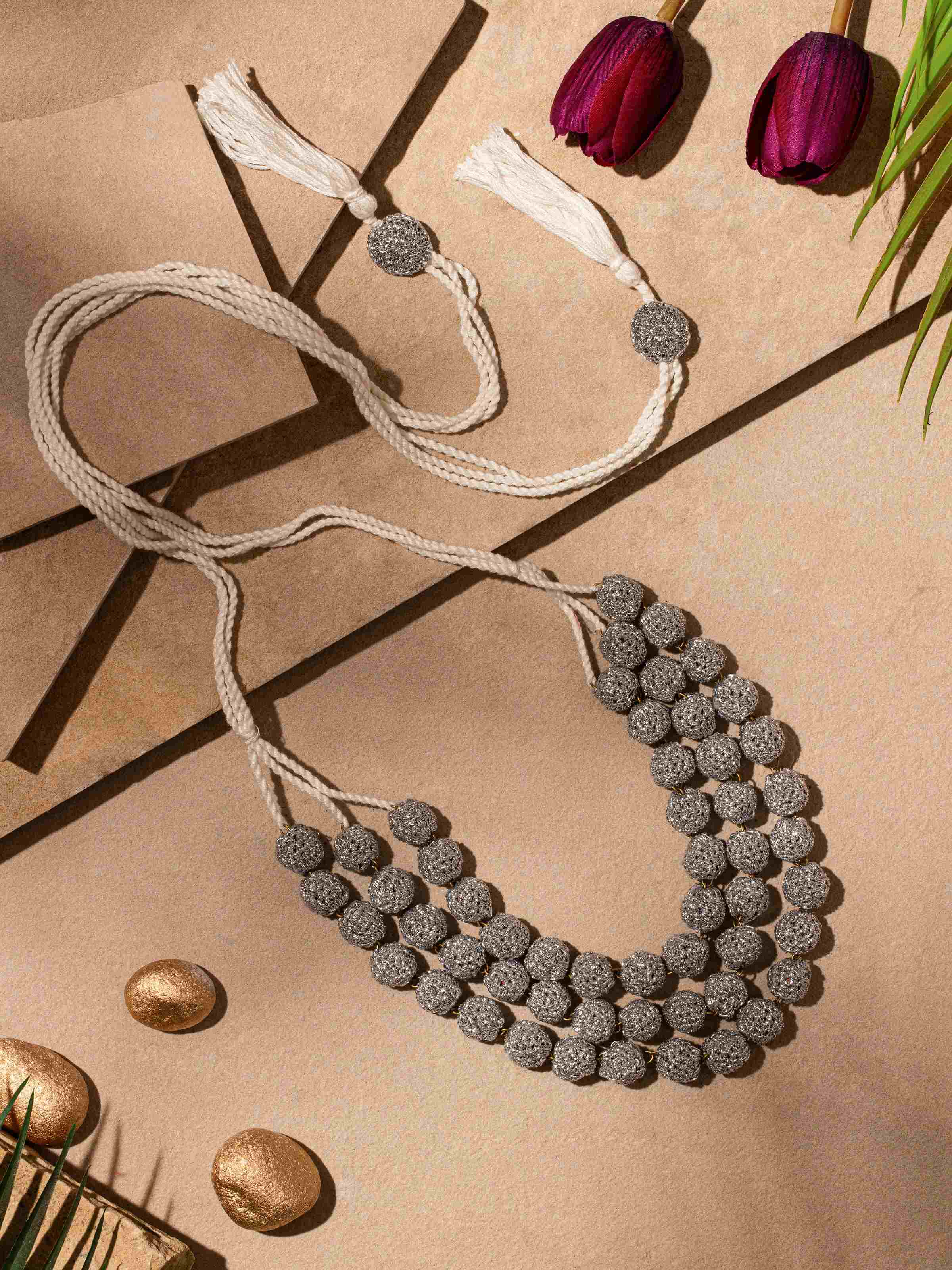 Side view of Crochet Long Necklace, highlighting detailed work