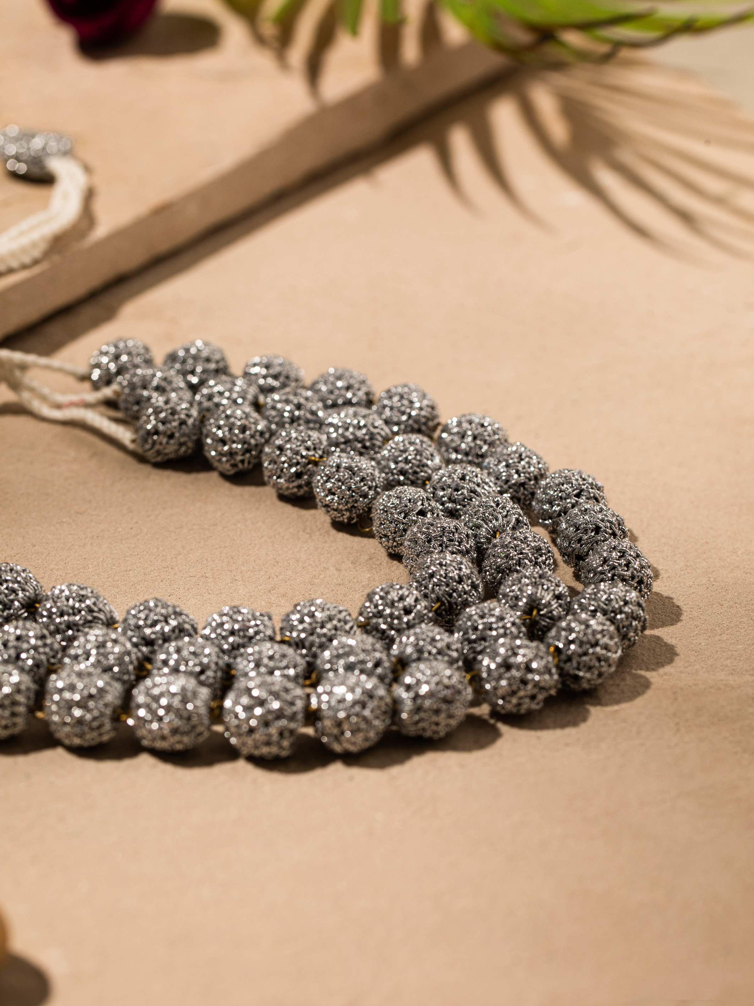 Detailed view of Crochet Long Necklace, featuring intricate details