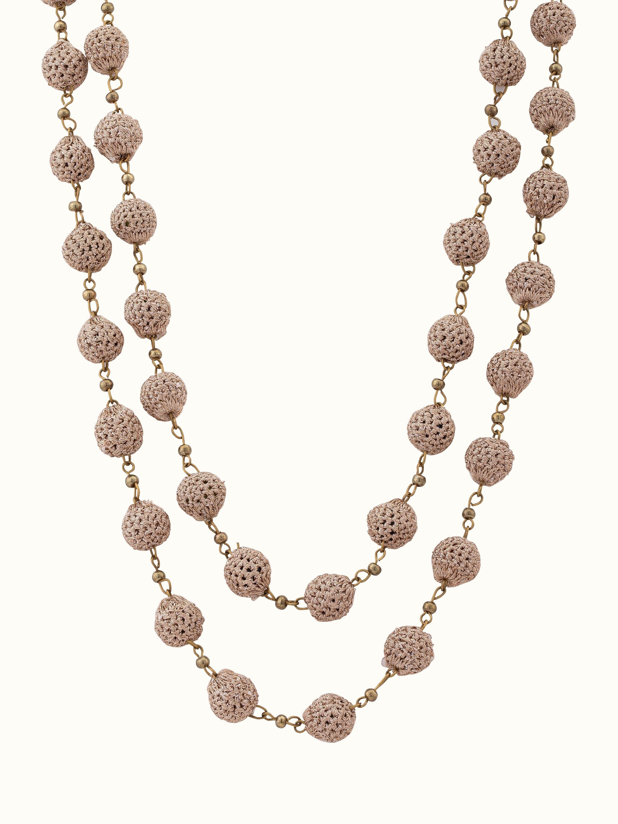 Front view of crochet long necklace showcasing its elegant length and intricate crochet work.