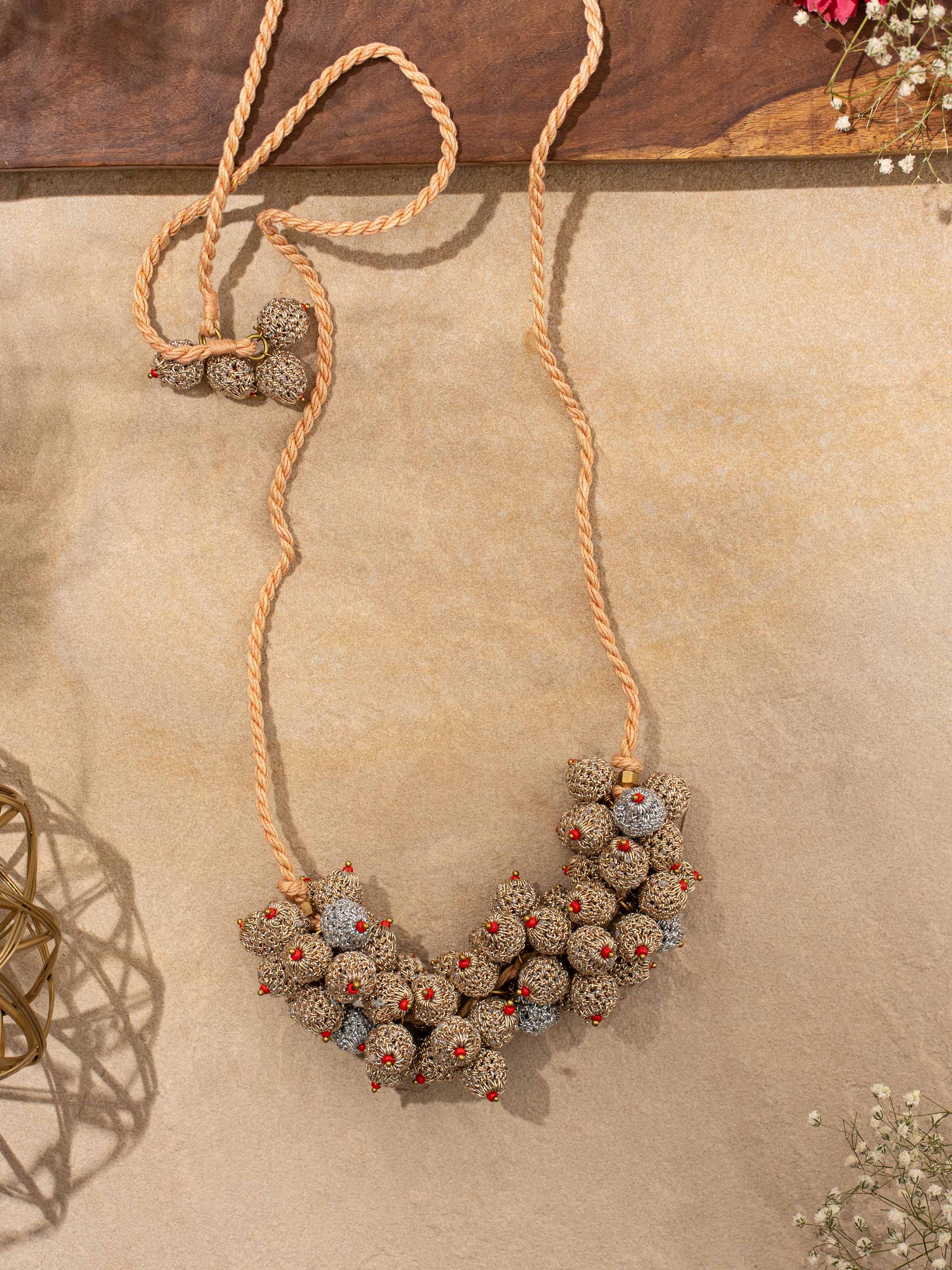 Close-up of Crochet Collar Necklace highlighting its handcrafted crochet work and elegant appearance.