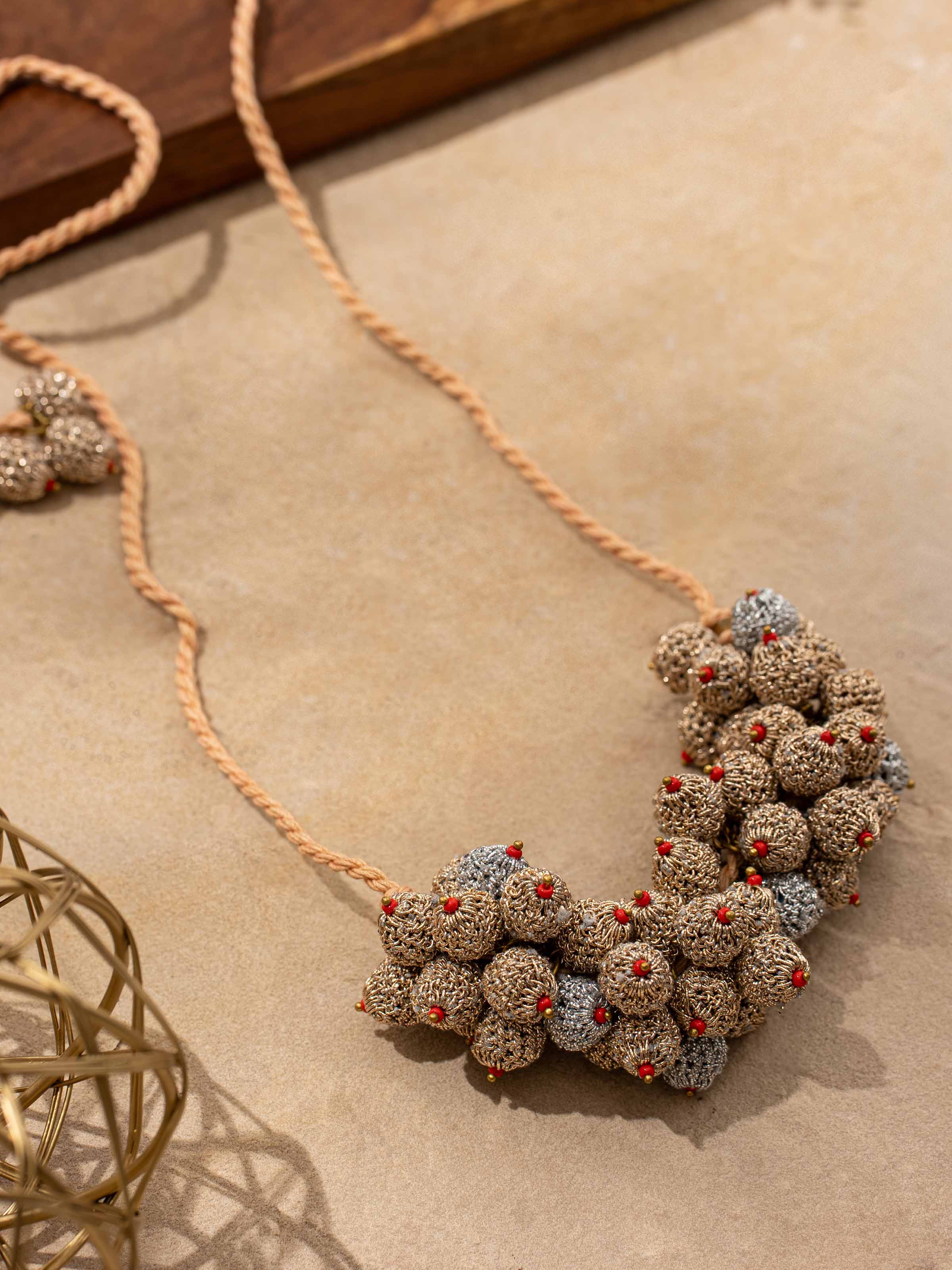 Detailed view of Crochet Collar Necklace highlighting its unique crochet work and stylish finish.