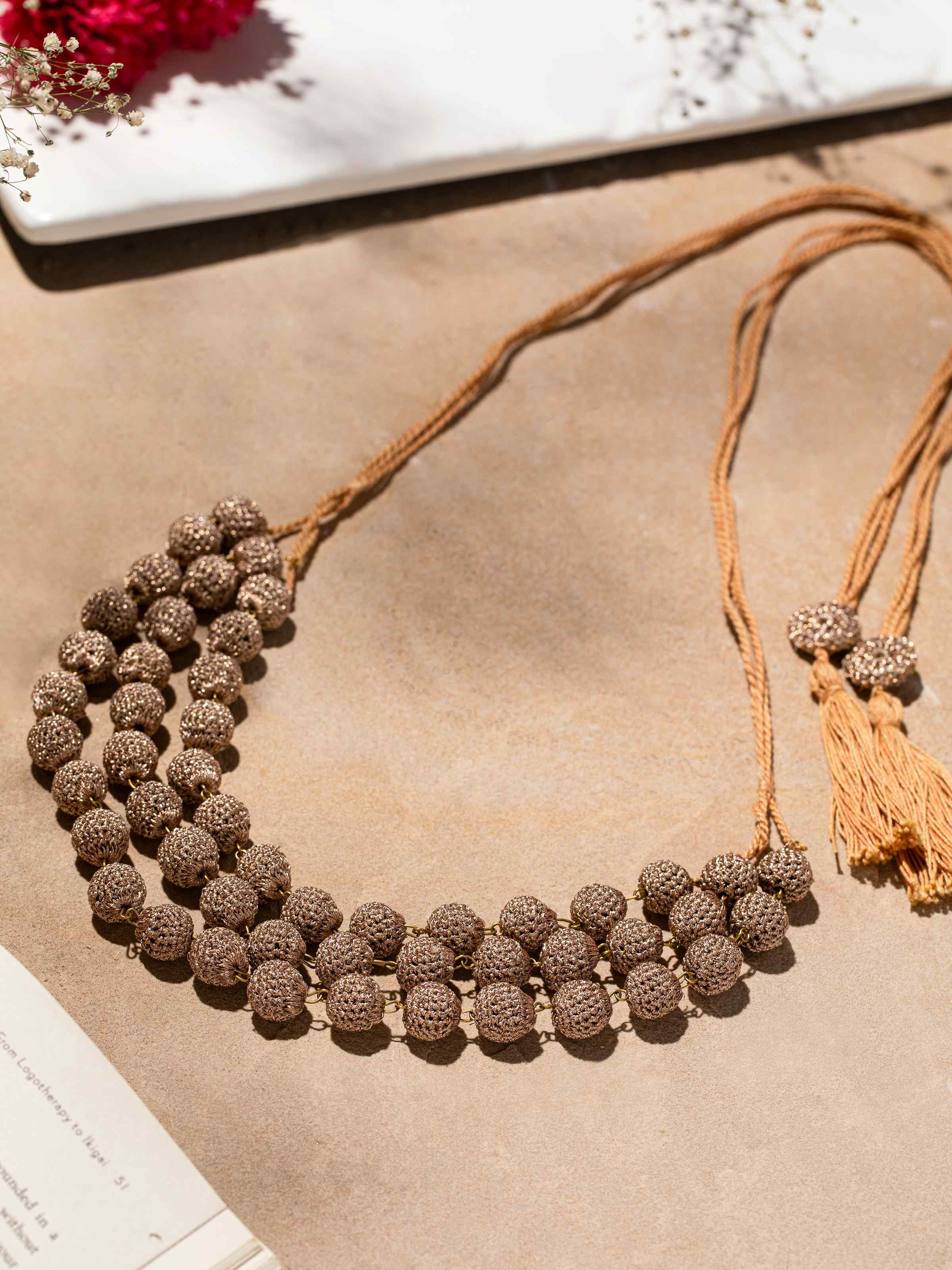 Close-up view of Crochet Long Necklace highlighting fine crochet work and pattern.