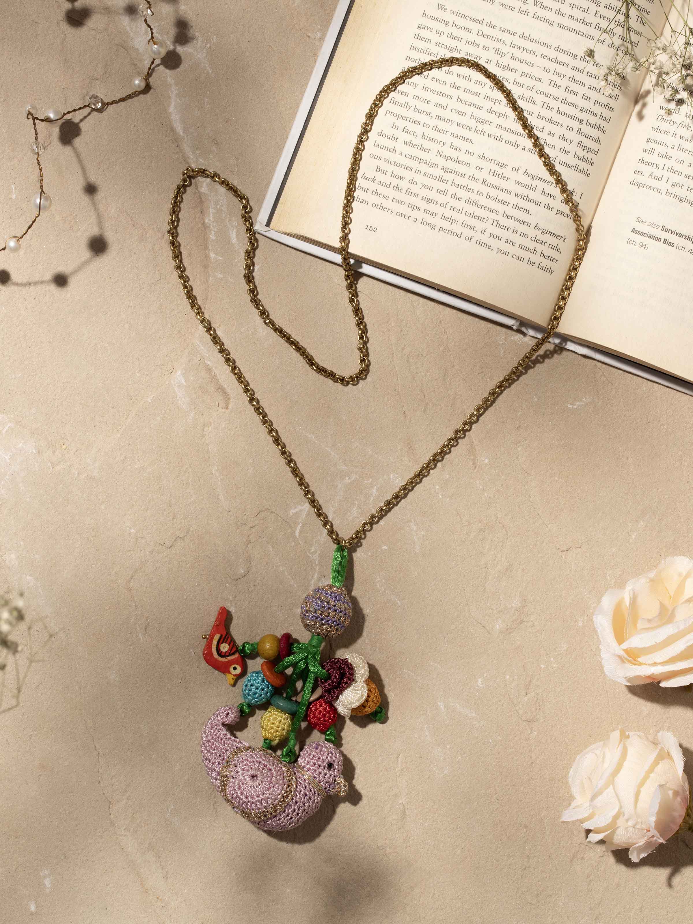 Side view of Crochet Pendant with Chain, highlighting craftsmanship