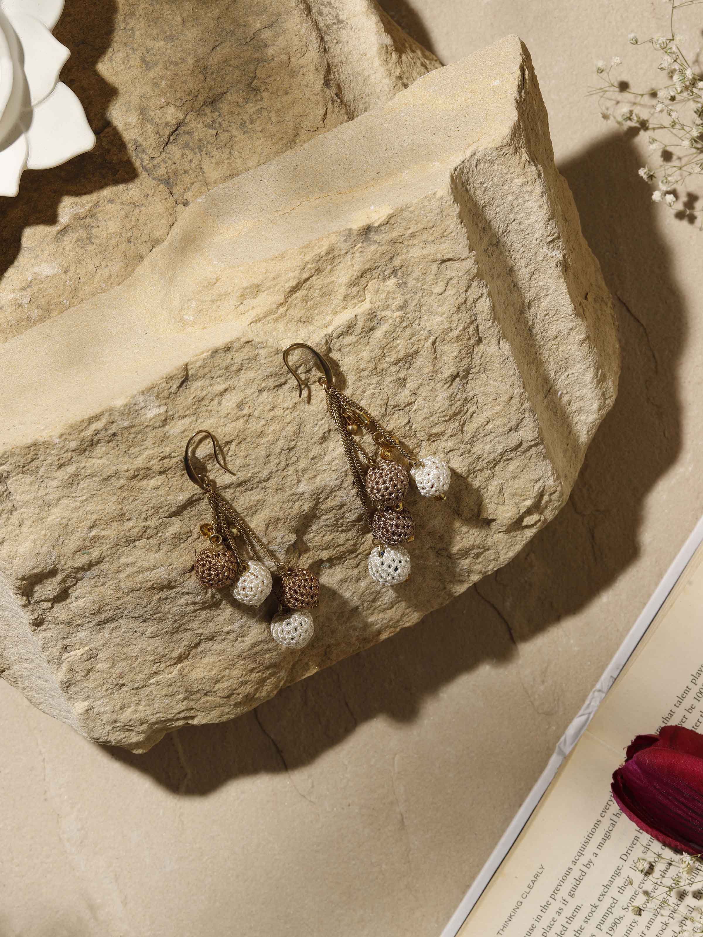 Side view of Crochet Drop Earrings displaying the unique crochet design and drop length.