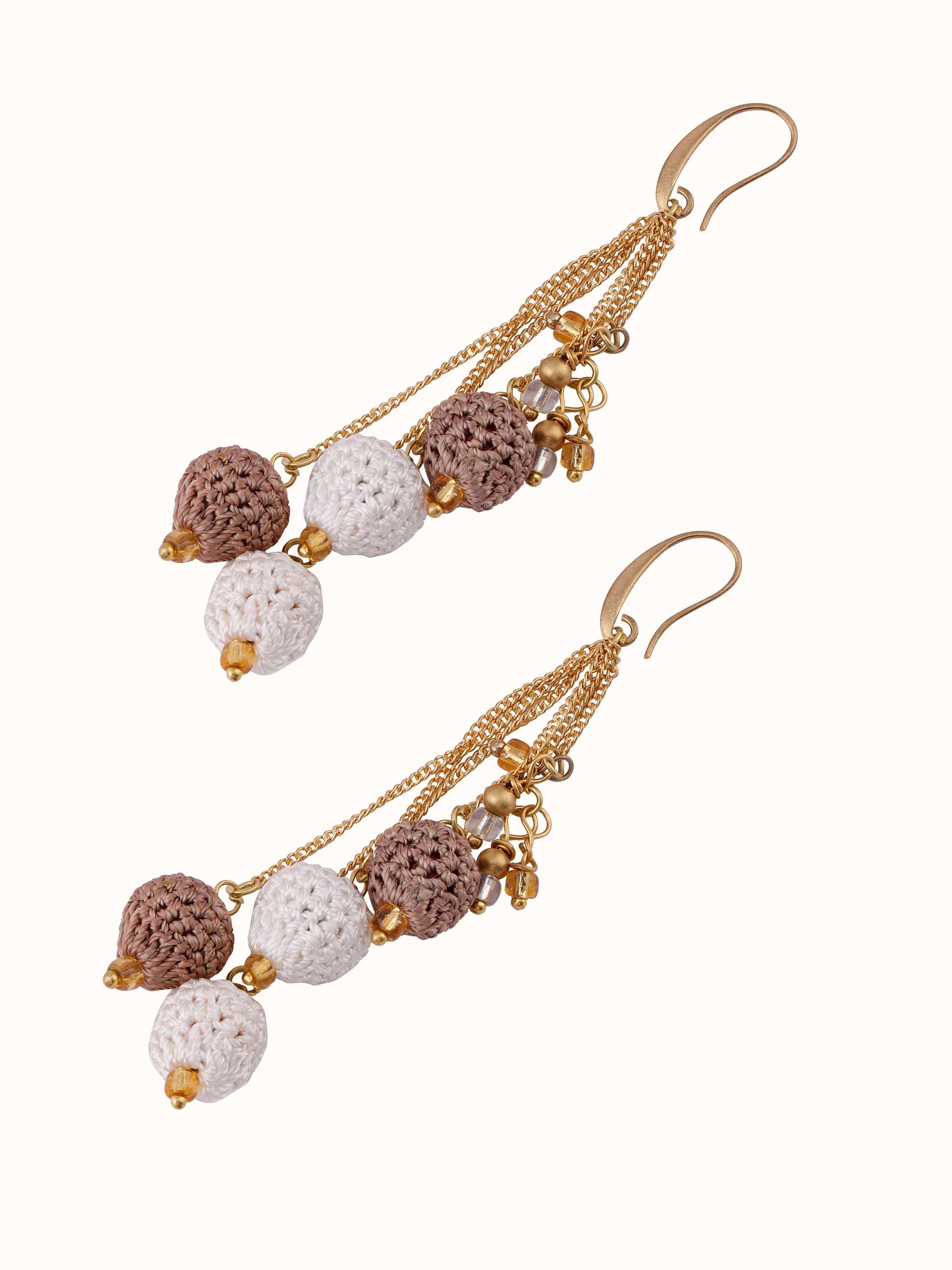 Angled view of Crochet Drop Earrings emphasizing the modern crochet design and elegant drop.