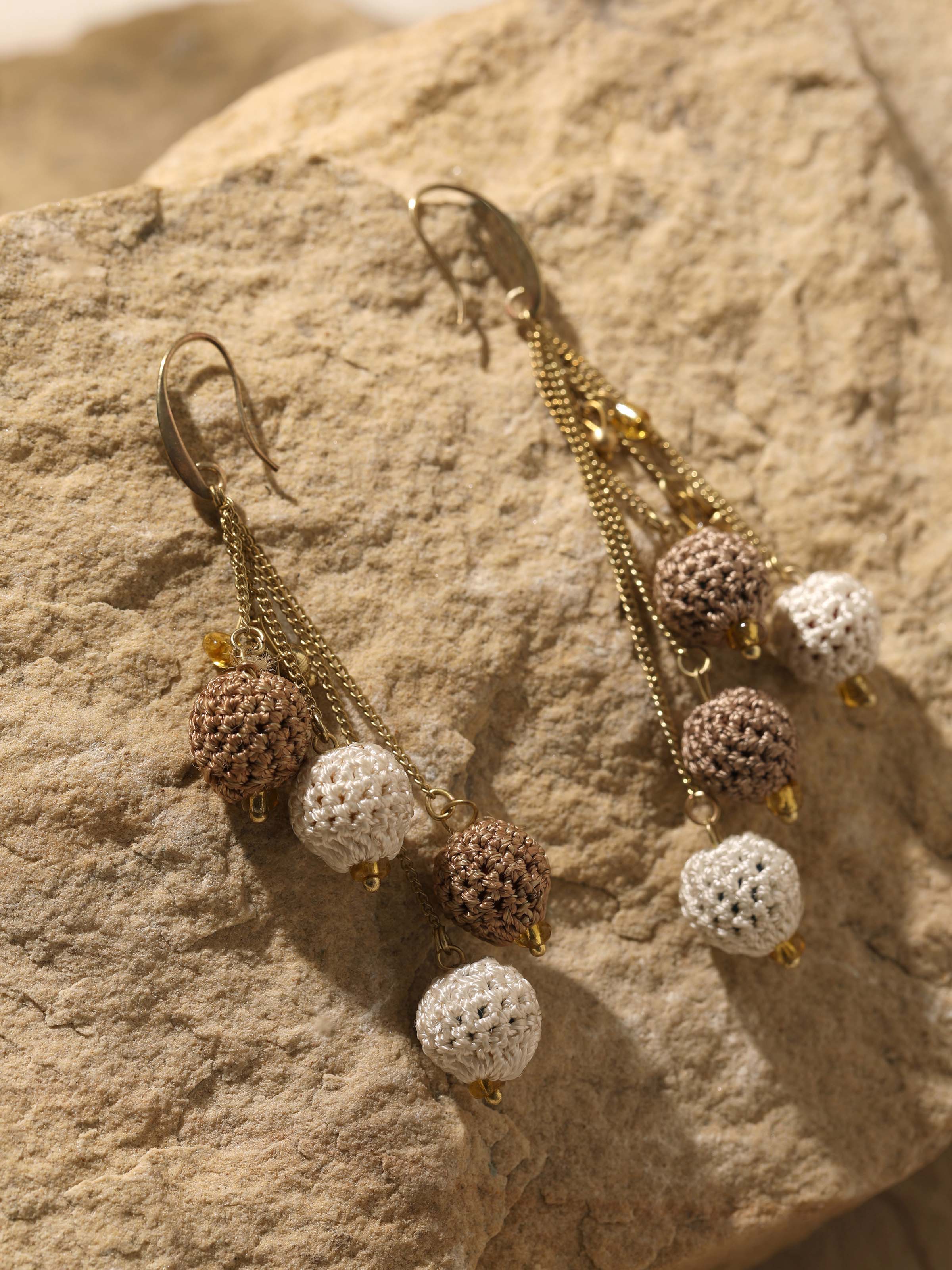 Detailed view of Crochet Drop Earrings highlighting the intricate crochet patterns and design quality.