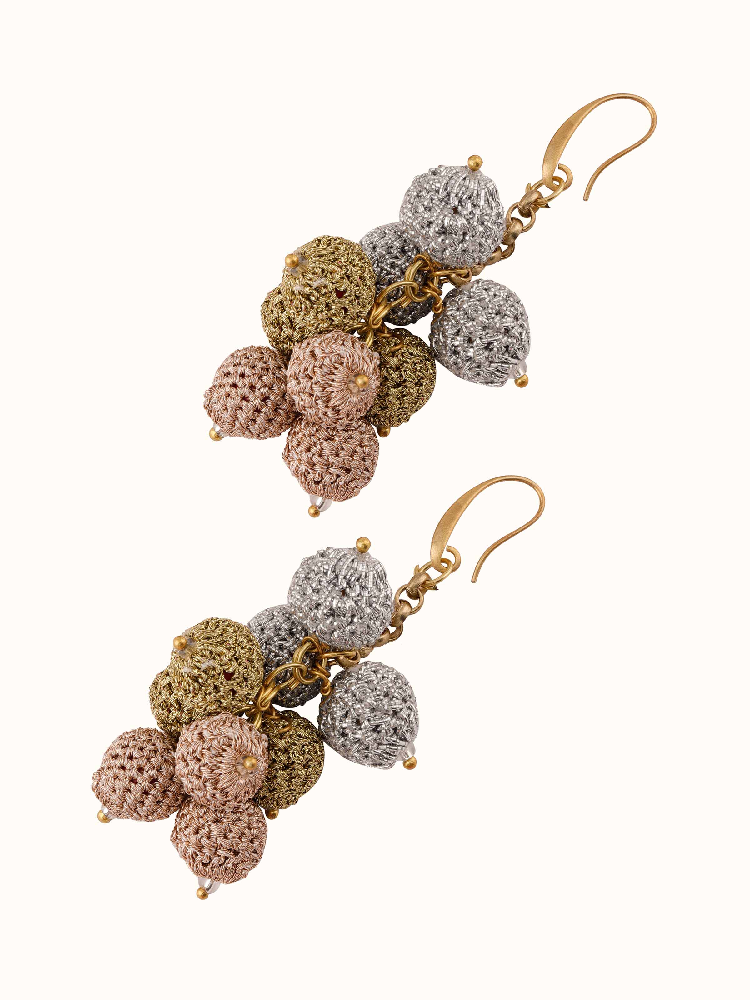 Angled view of Crochet Drop Earrings showcasing the elegant crochet work and drop design.