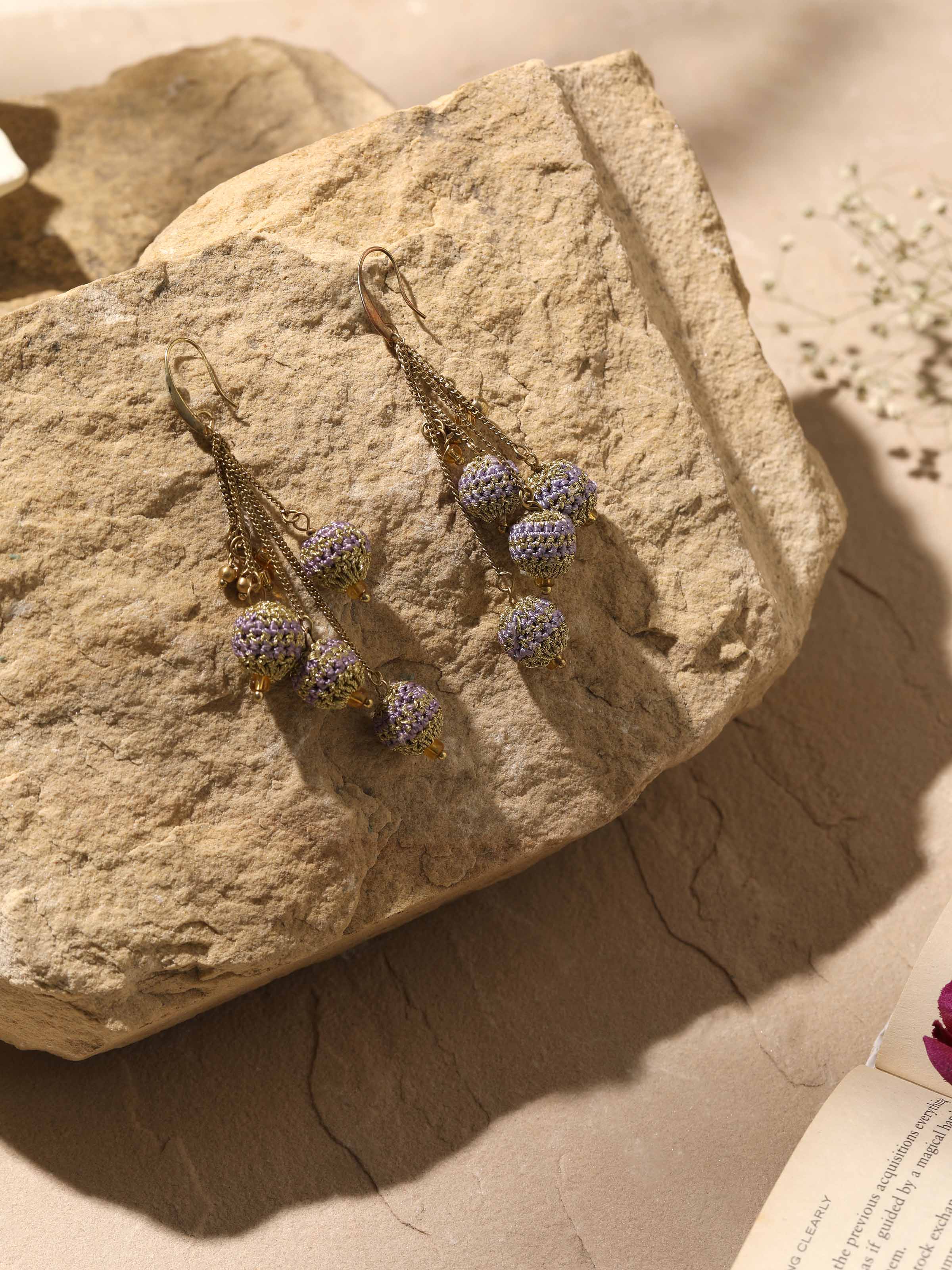 Close-up view of Crochet Drop Earrings highlighting intricate crochet work and bead details.