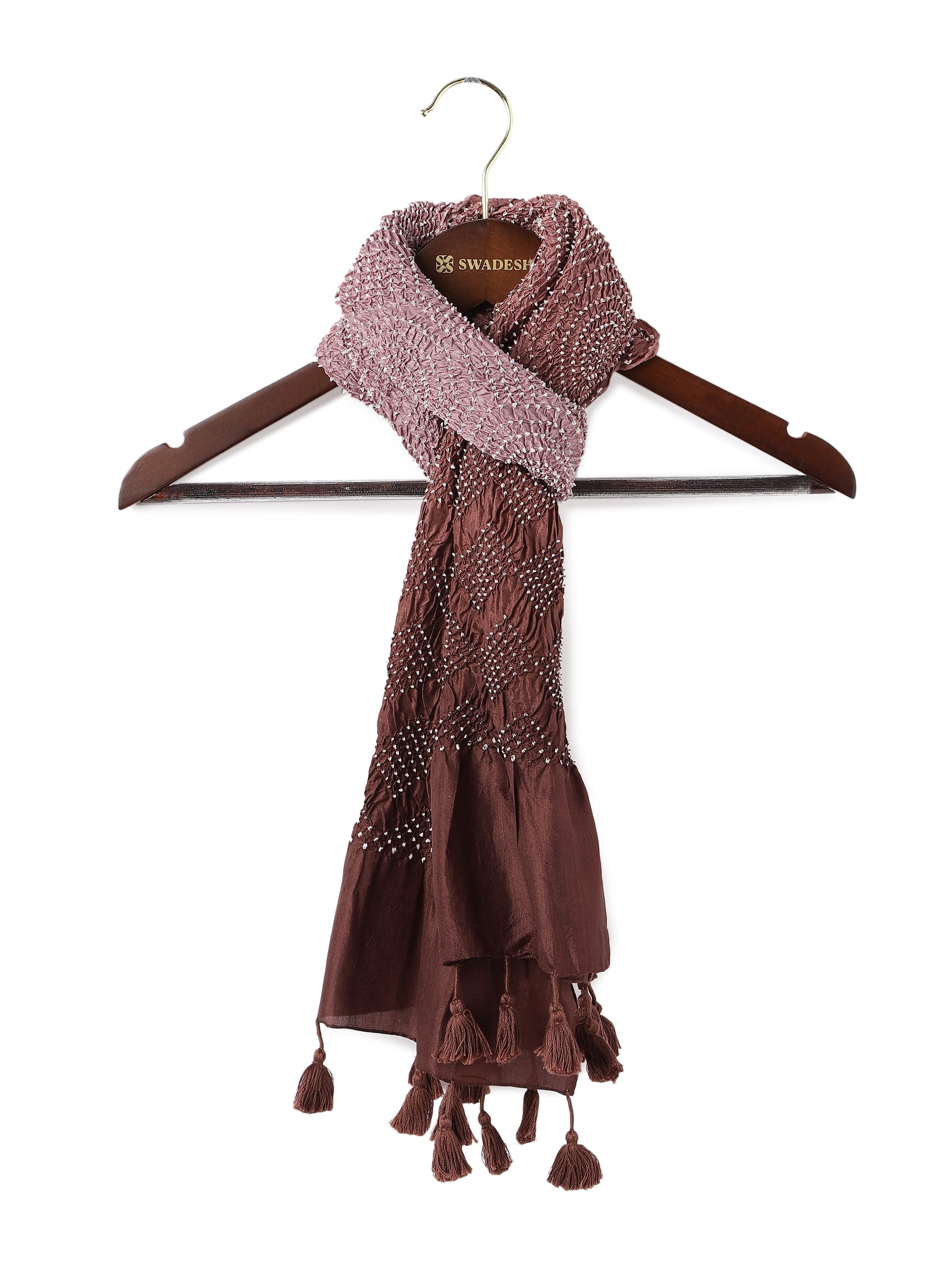 Front view of wine silk Bandhani stole with classic tie-dye patterns in white.
