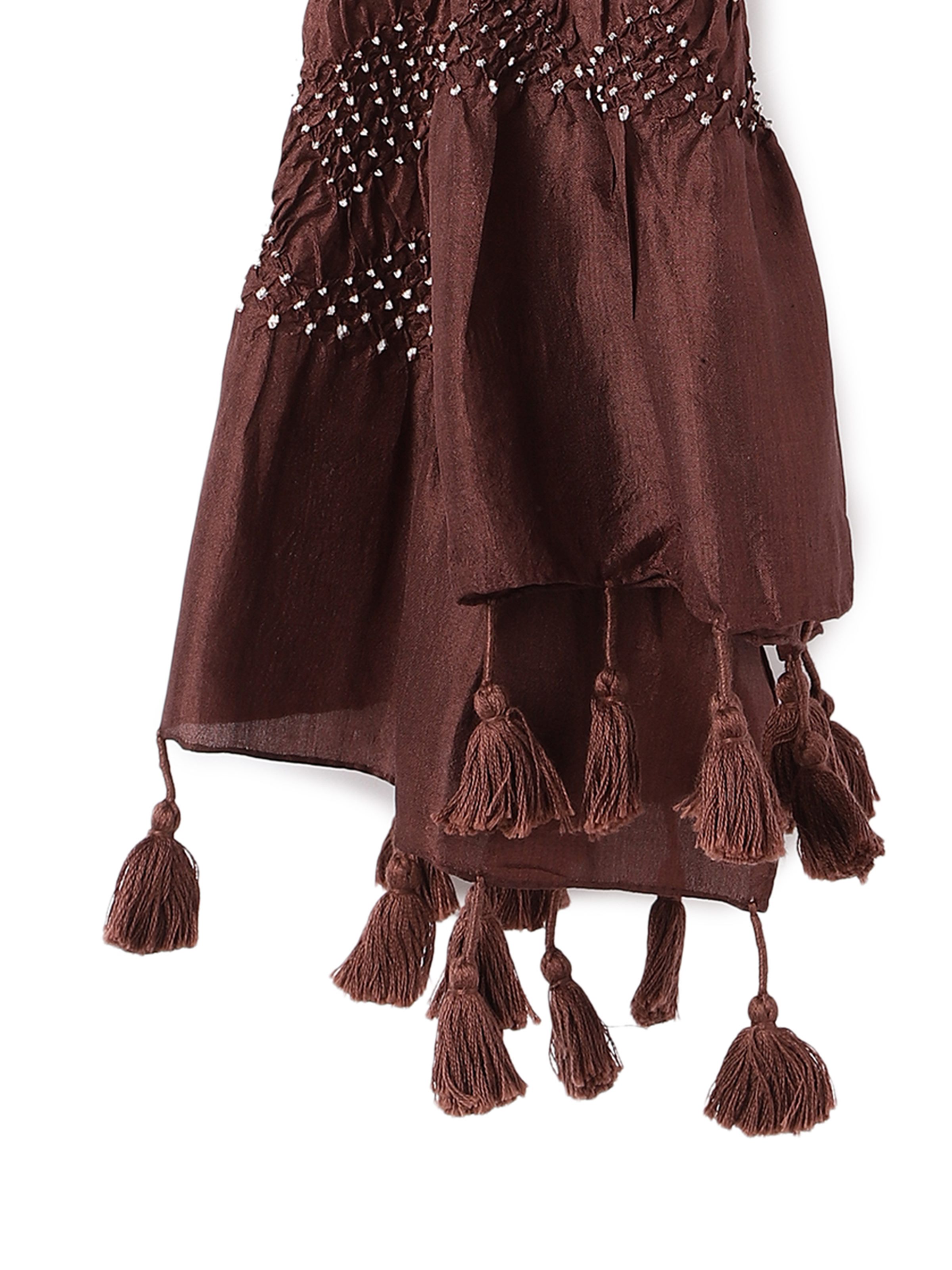 Detail view highlighting the fine tie-dye work and rich silk texture.