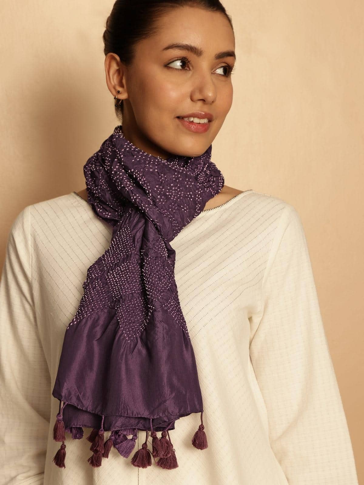 Lifestyle view of purple Bandhani silk stole draped elegantly with ethnic attire