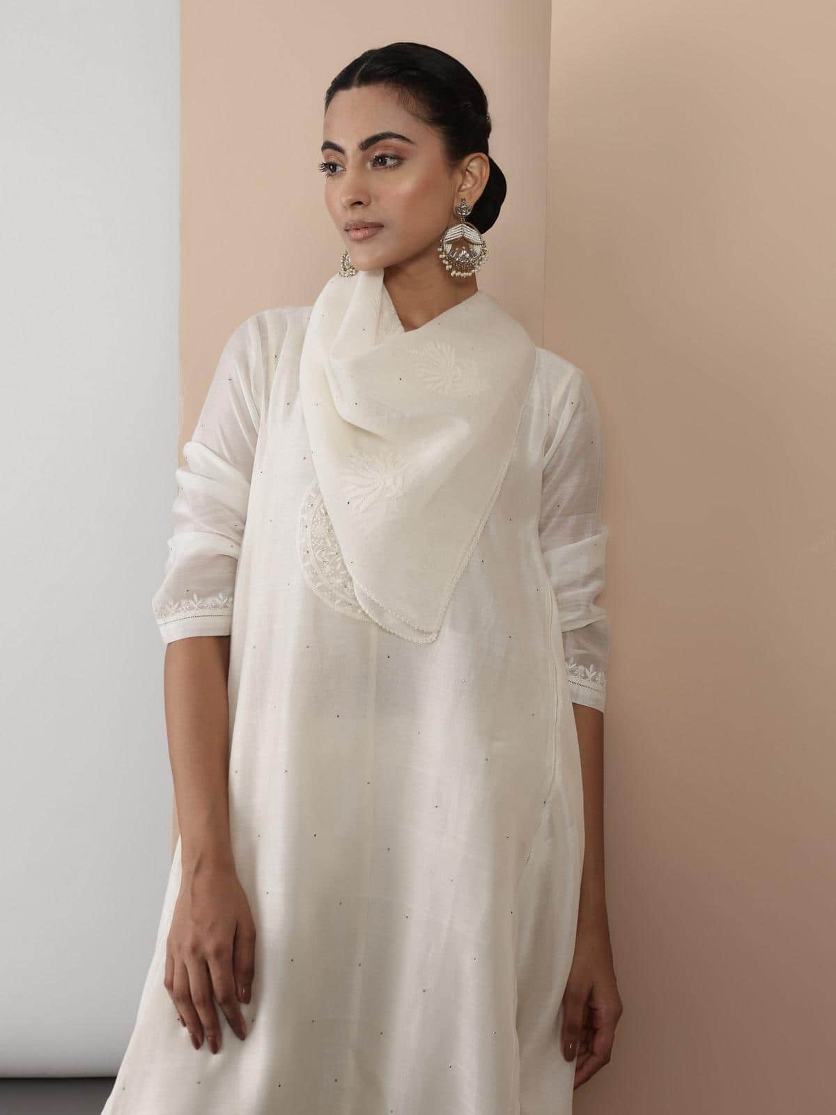 Lifestyle image of White Cotton Silk Chikankari Stole worn with casual attire.