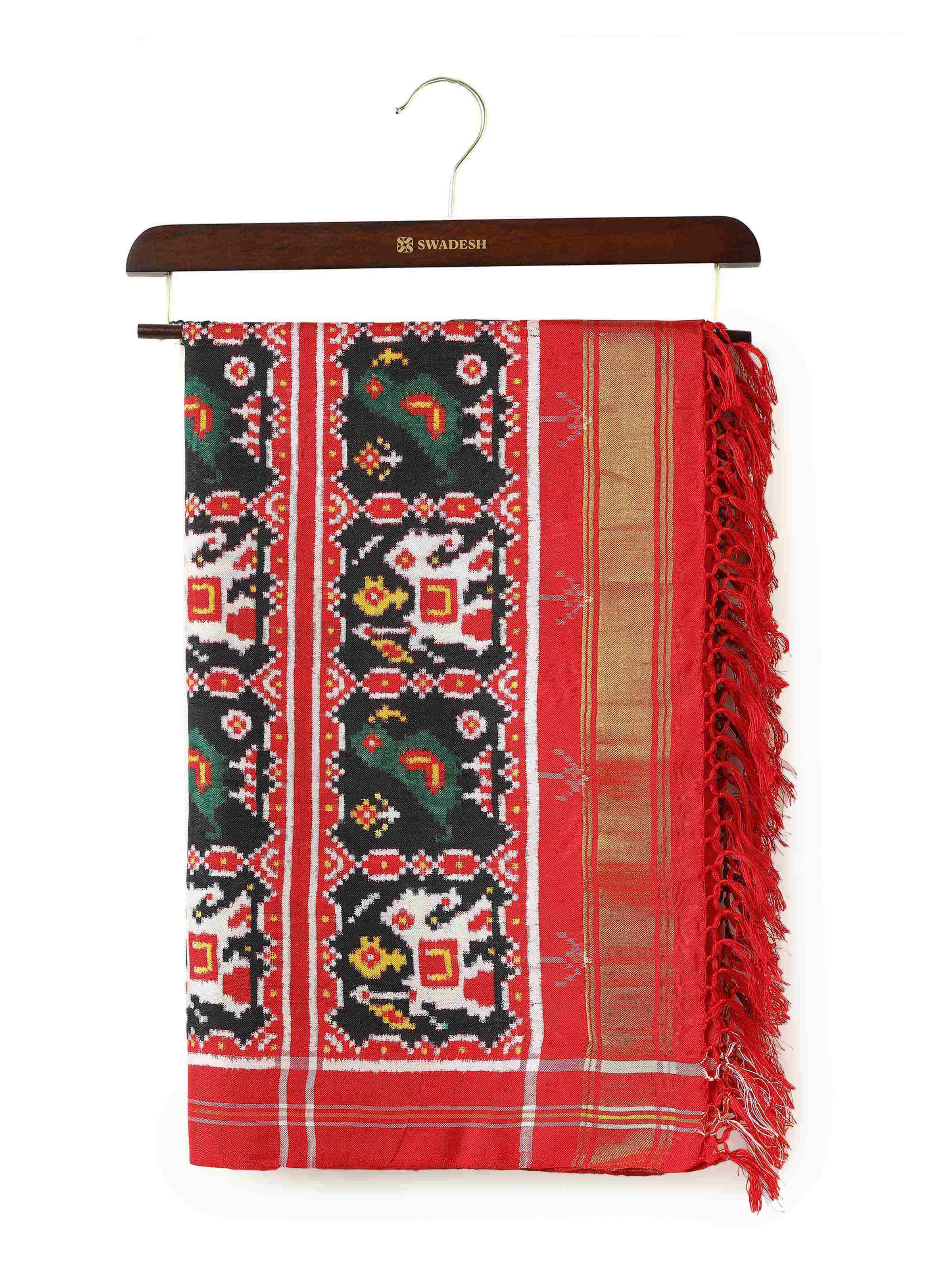 Front view of Black Silk Patola Dupatta displaying intricate Patola weaving patterns.