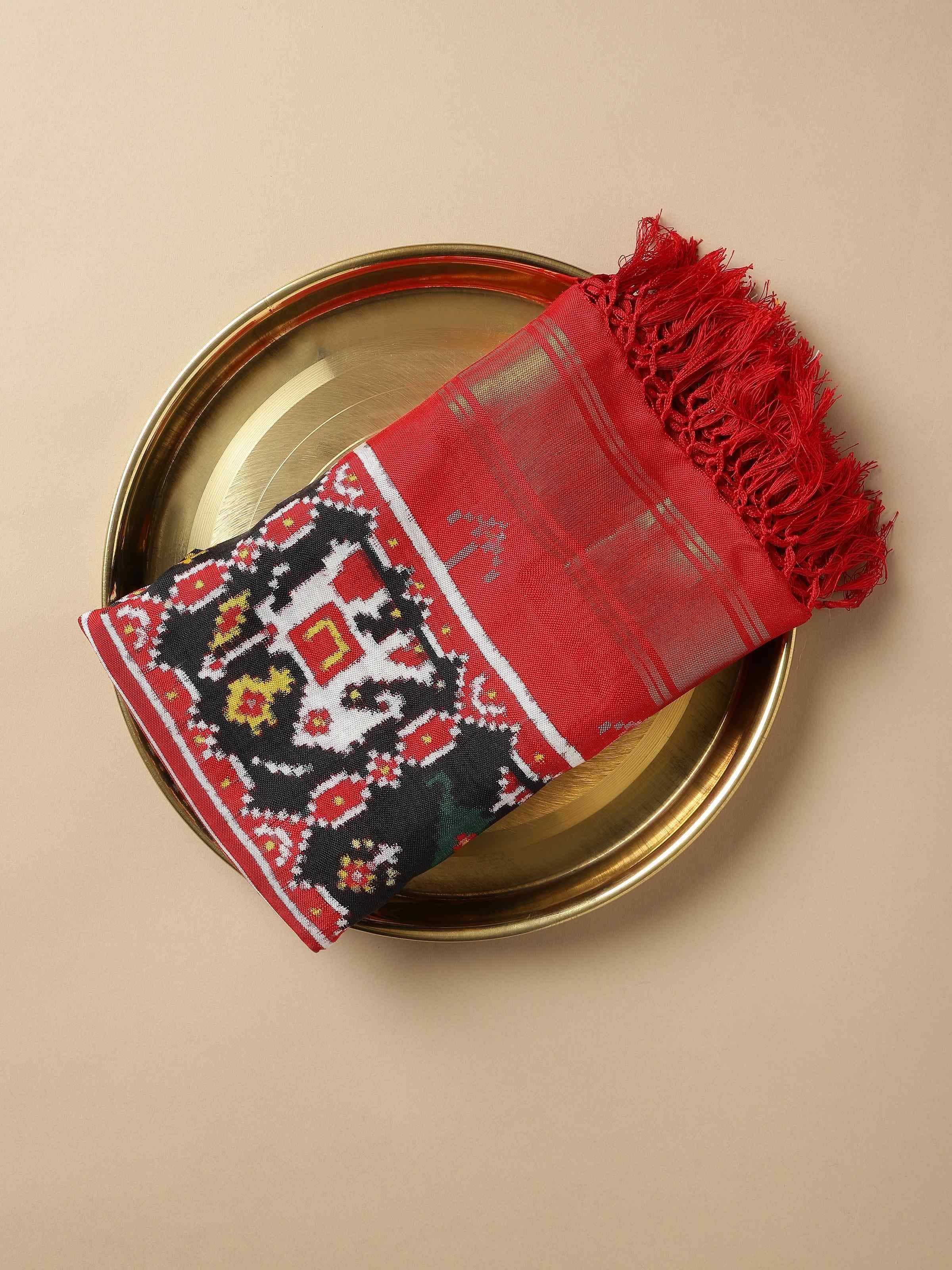 Close-up of Black Silk Patola Dupatta border and pattern details.