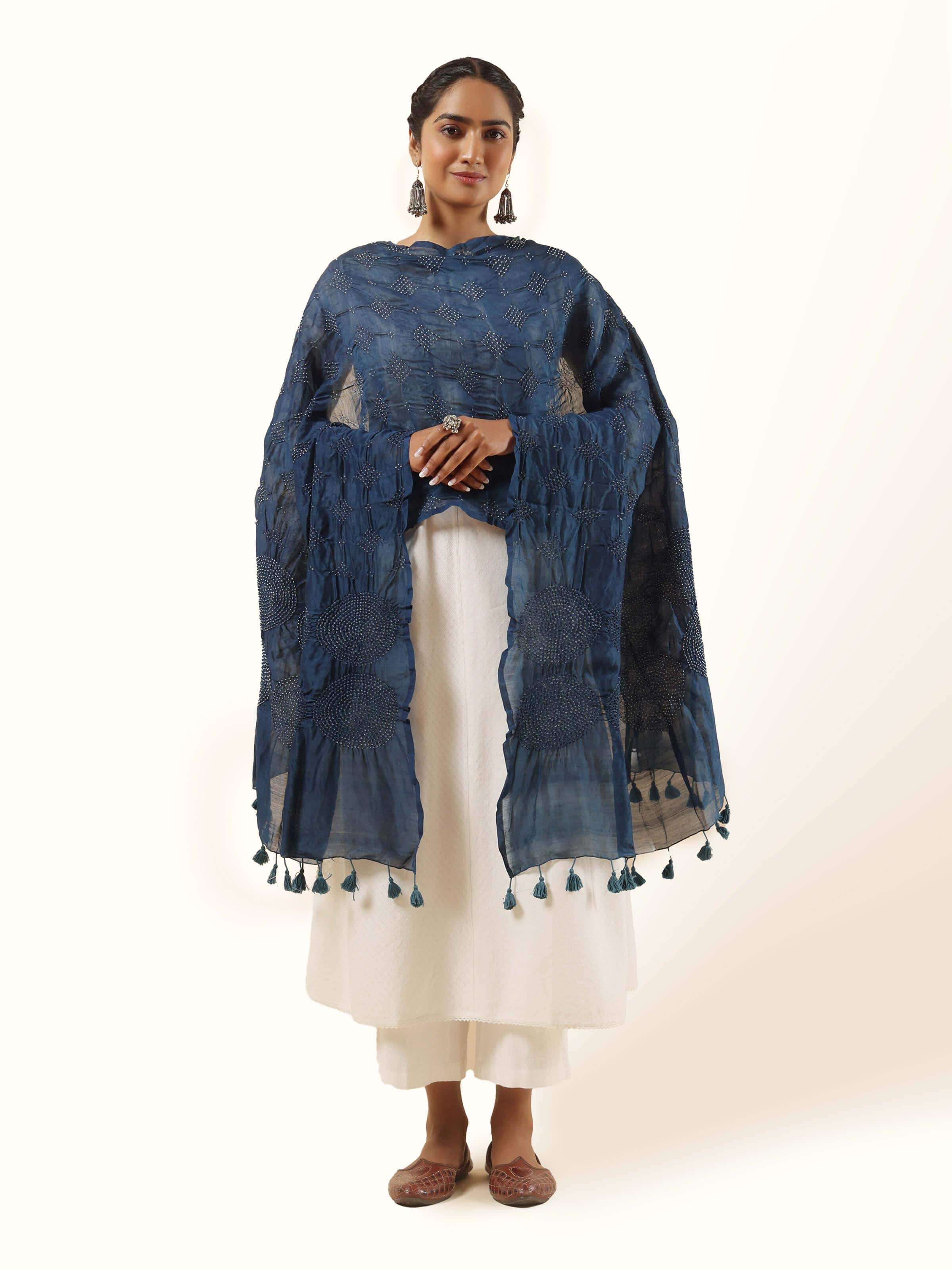 Indigo cotton Bandhani tie and dye dupatta displayed flat, featuring traditional dotted patterns and rich indigo color.