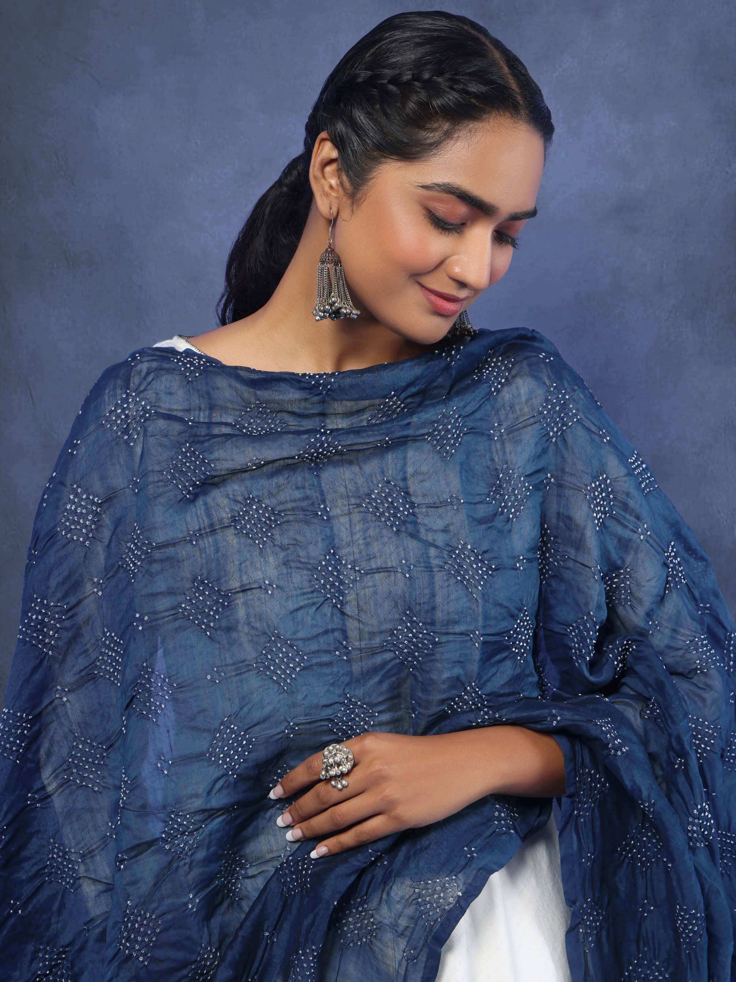 Angled view of indigo Bandhani dupatta draped elegantly, highlighting the detailed tie-dye craftsmanship.