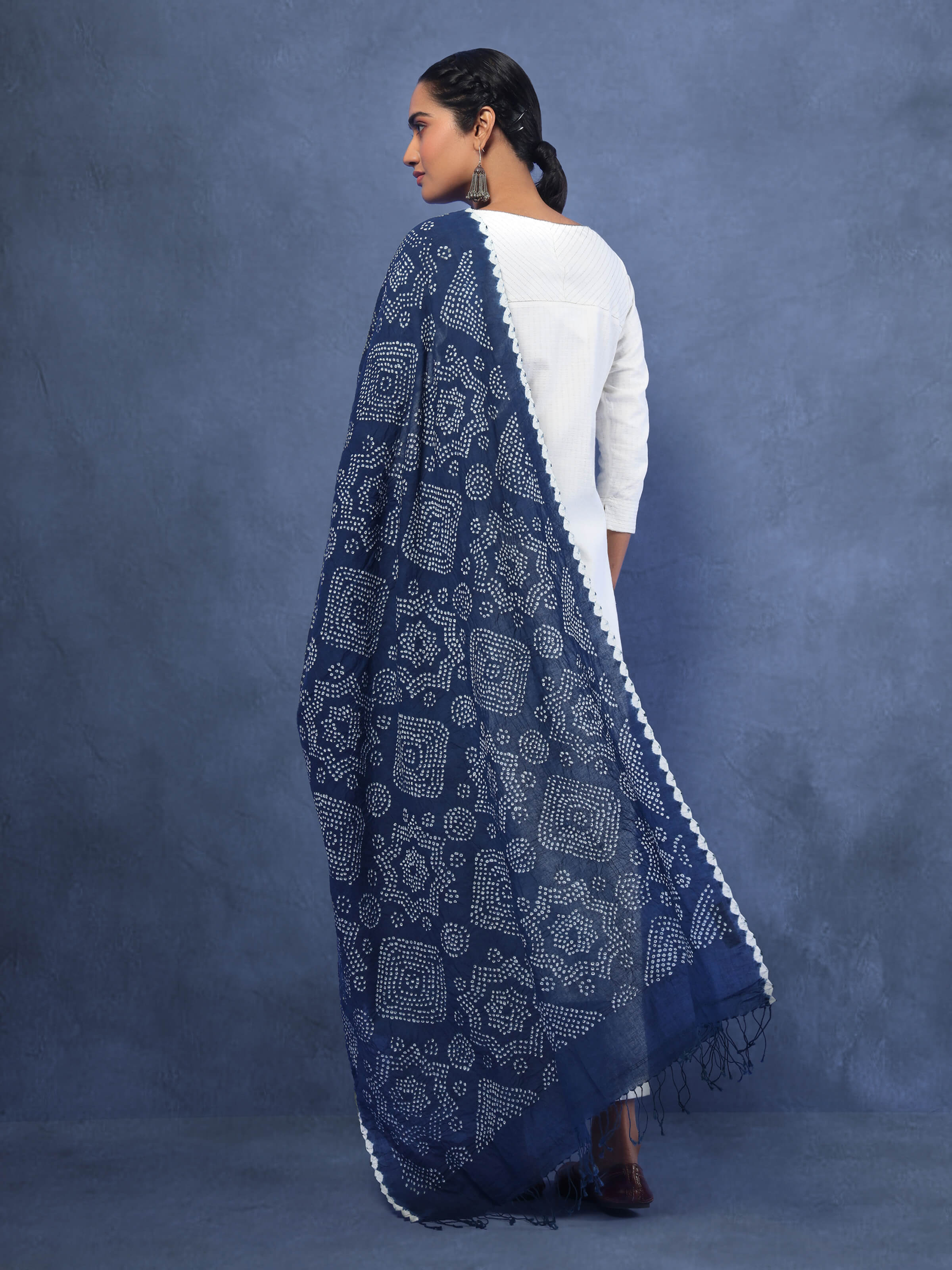 Angled view of cotton Bandhani tie-dye dupatta highlighting its texture and dye detailing