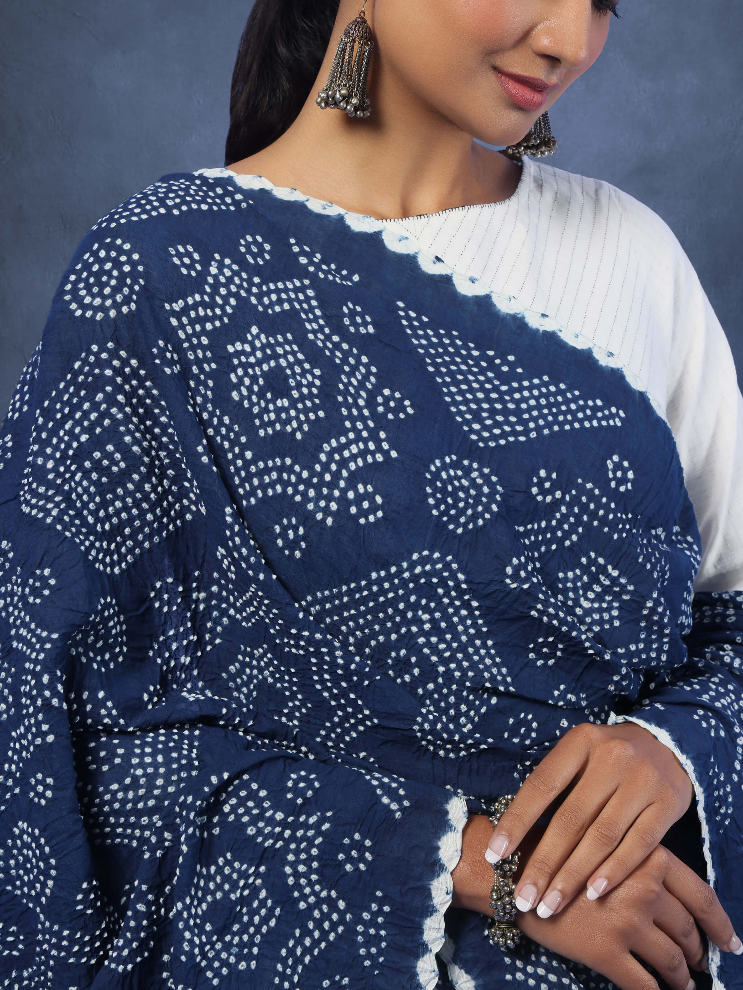 Detail shot of cotton Bandhani tie-dye dupatta focusing on the tie-dye motif and fabric weave