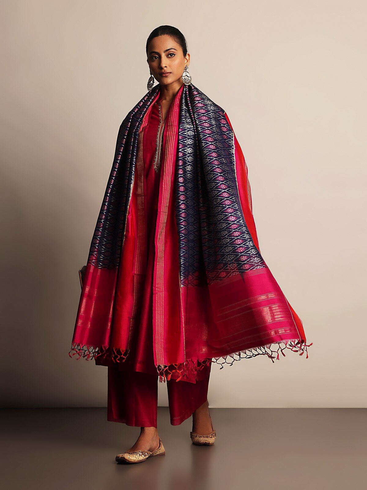 Lifestyle image showing rich color and elegant fabric fall.