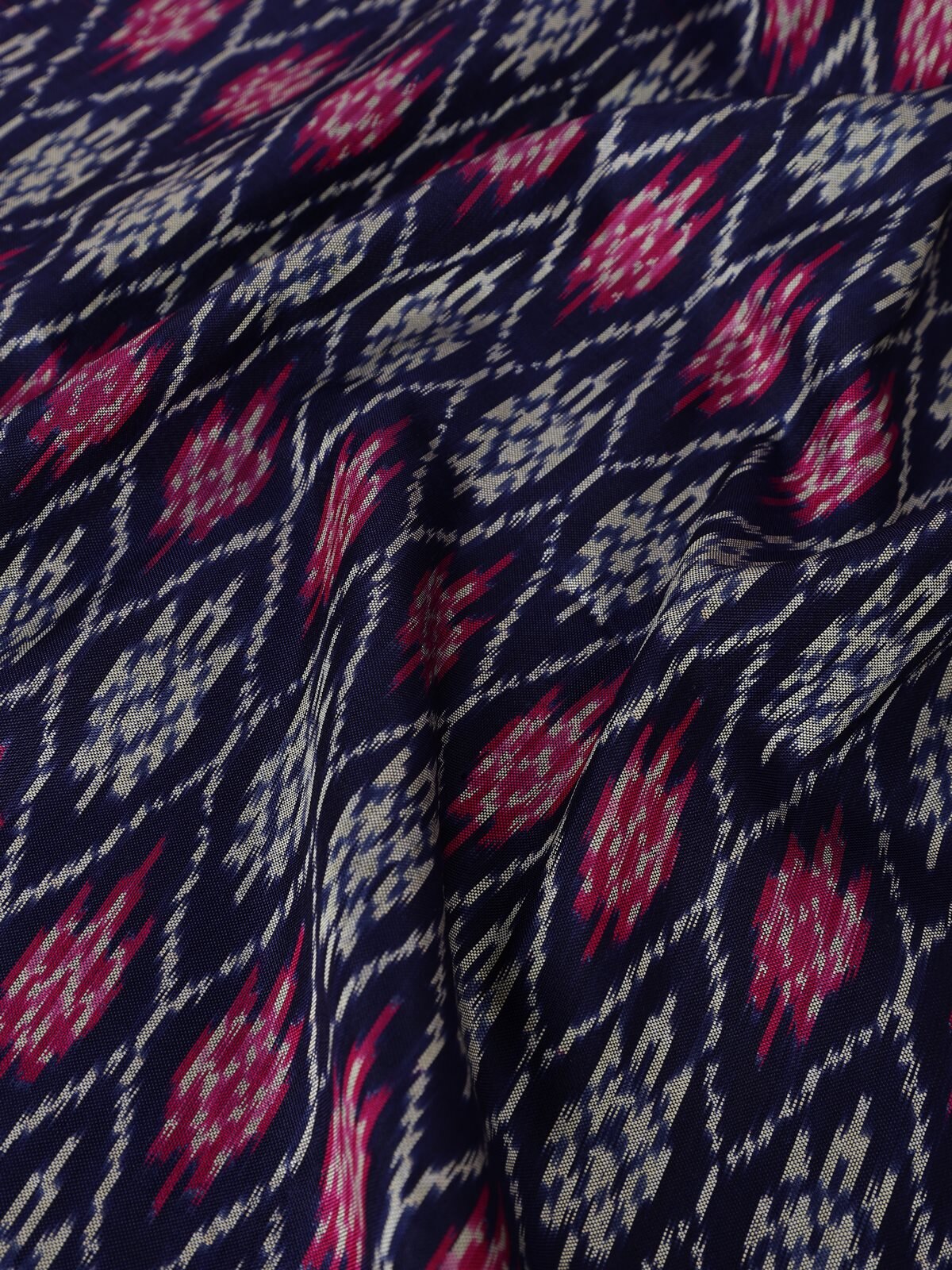 Draped angle showcasing traditional styling and texture.