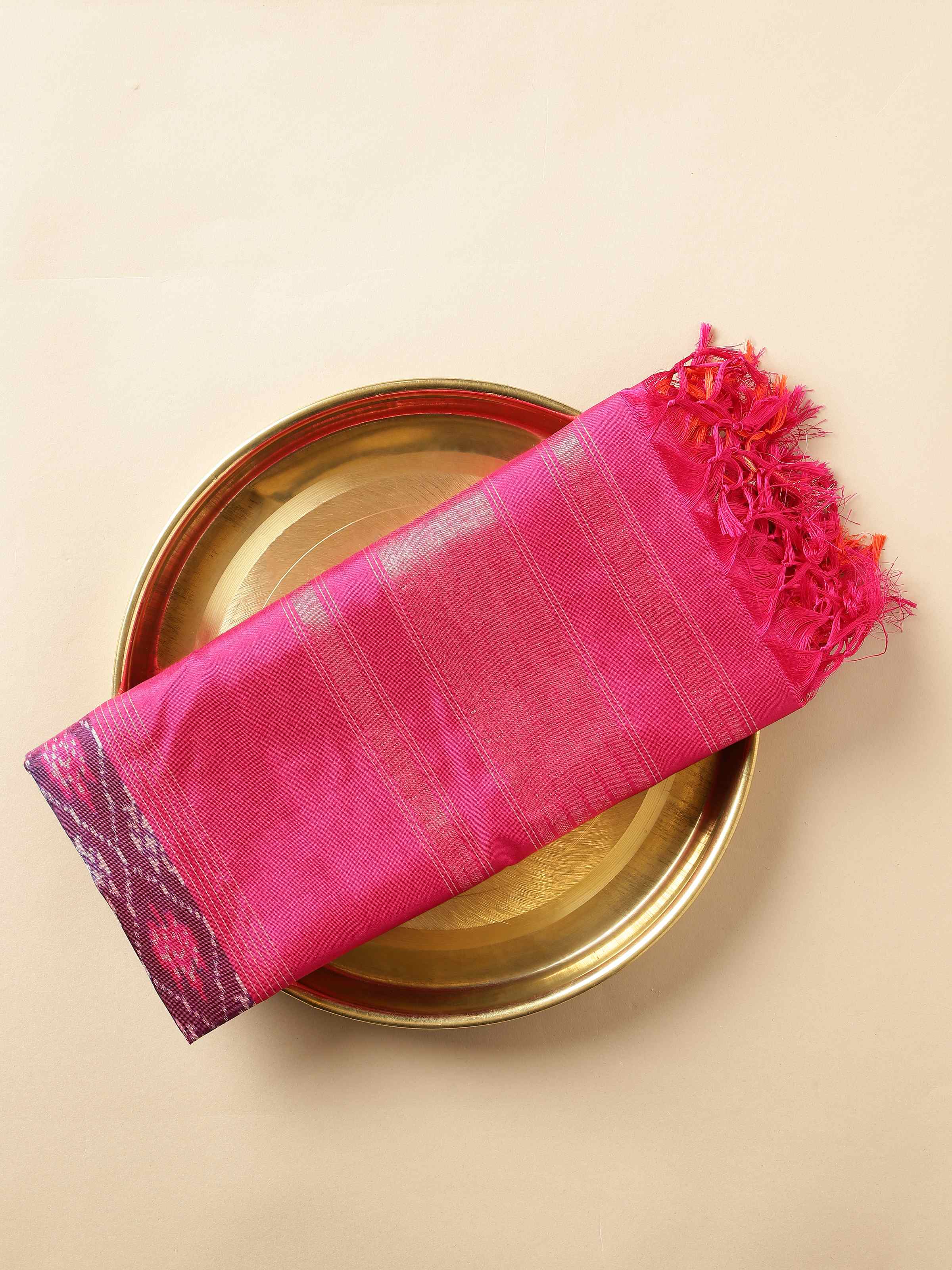 Close-up of border work and fabric sheen in full view.