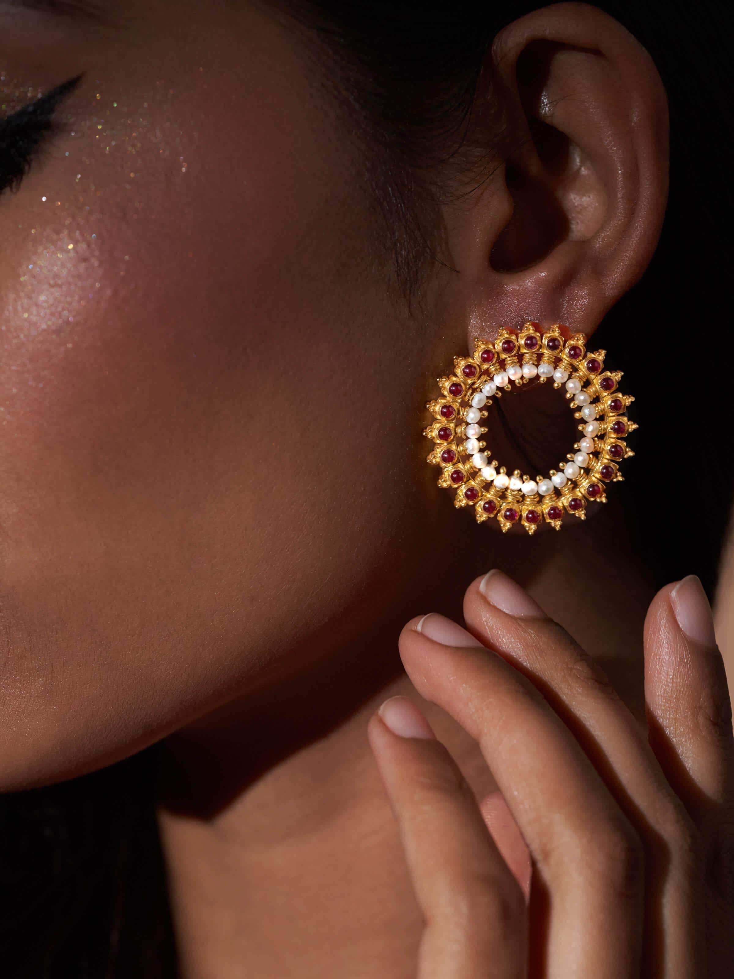 Artistic angle capturing the texture and craftsmanship of Guttapusalu silver studs