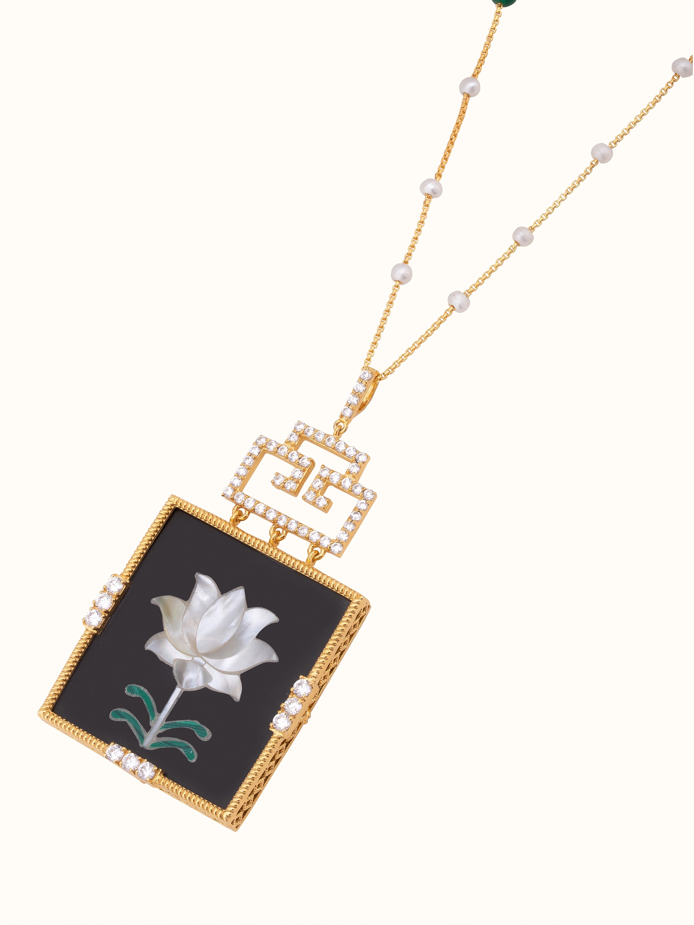 Detailed view of Pacchikari silver pendant & chain focusing on the craftsmanship and intricate design.