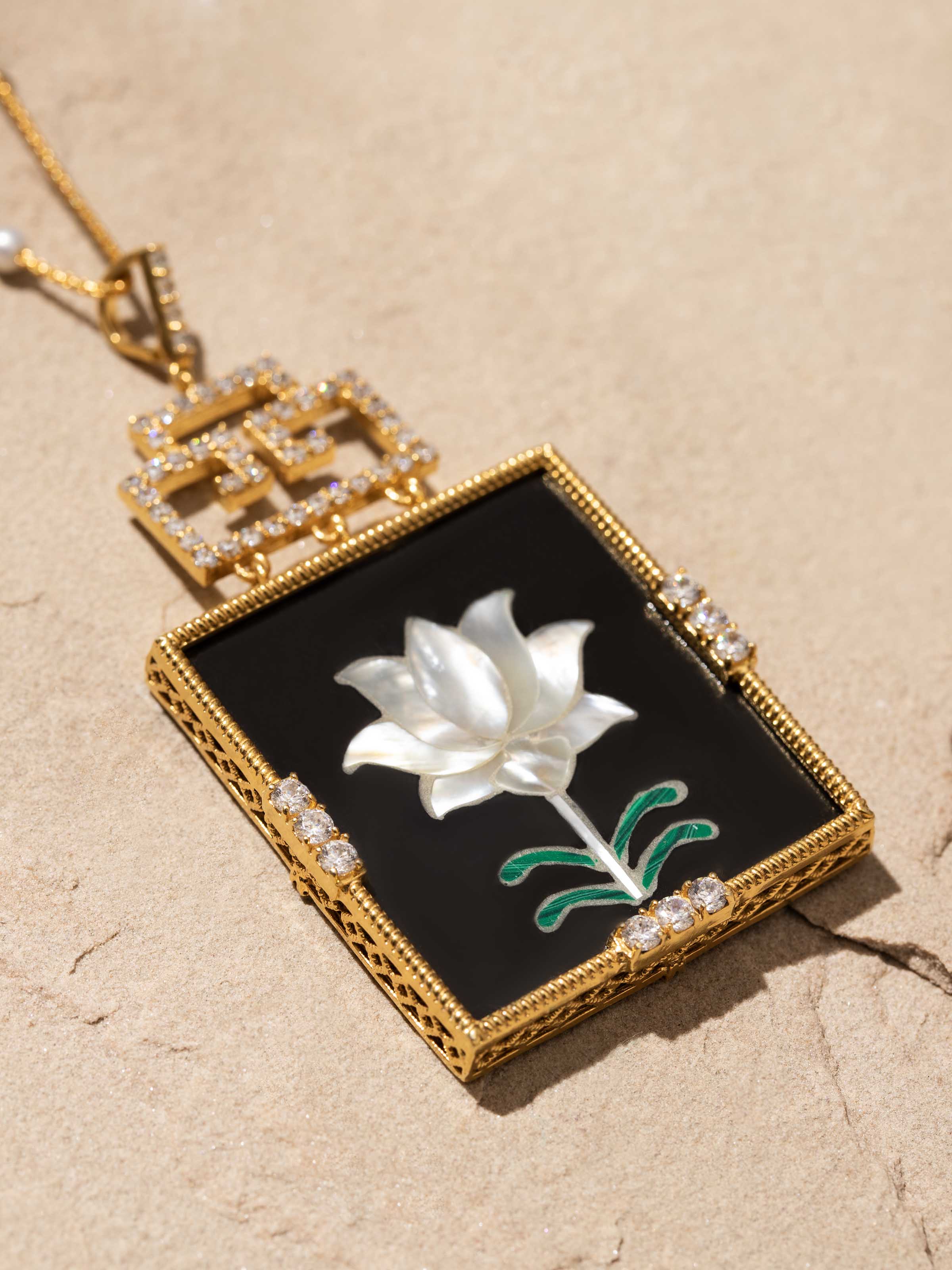 Back view of Pacchikari silver pendant & chain showing the secure clasp and overall design.