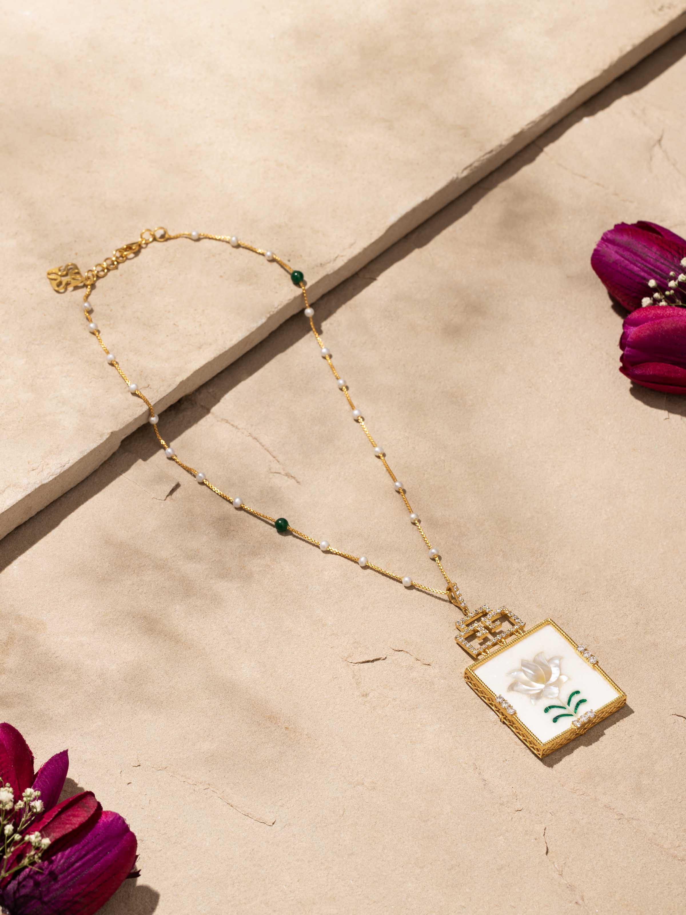 Close-up view of Pacchikari Silver Pendant and Chain displaying the intricate silver work and refined design.