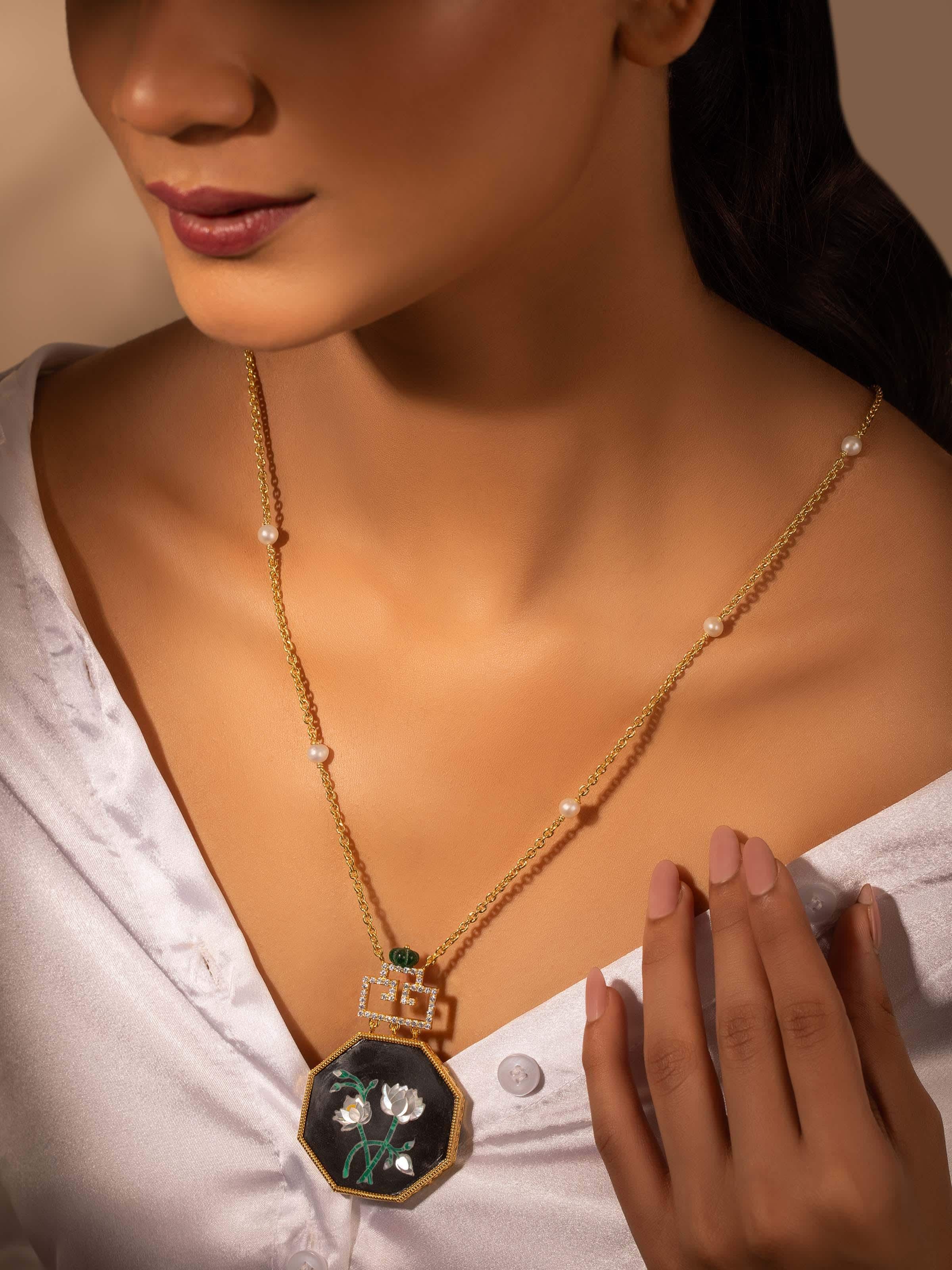 Lifestyle image highlighting the pendant worn with traditional attire