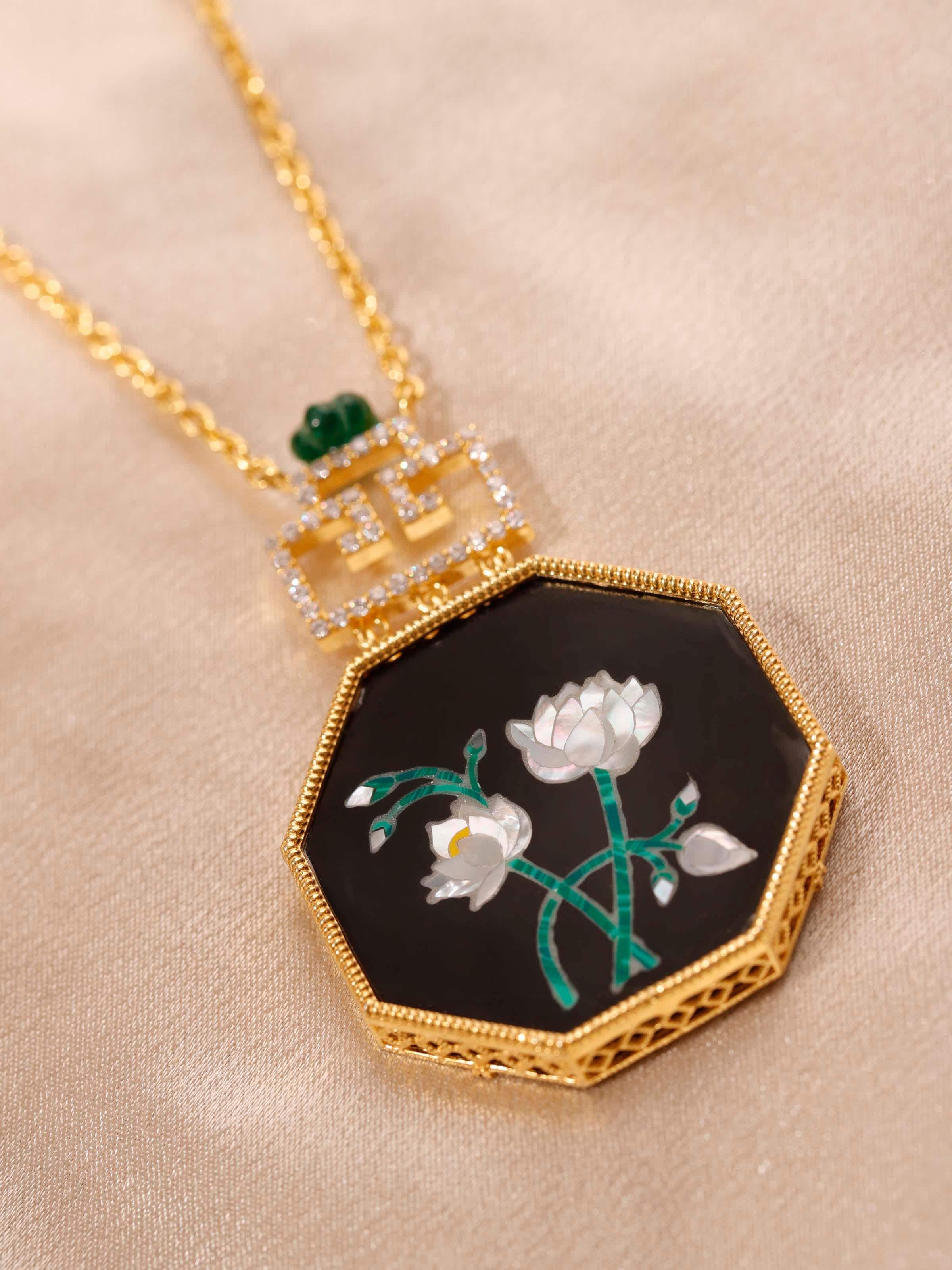 Close-up detail capturing the intricate Pacchikari work on the pendant