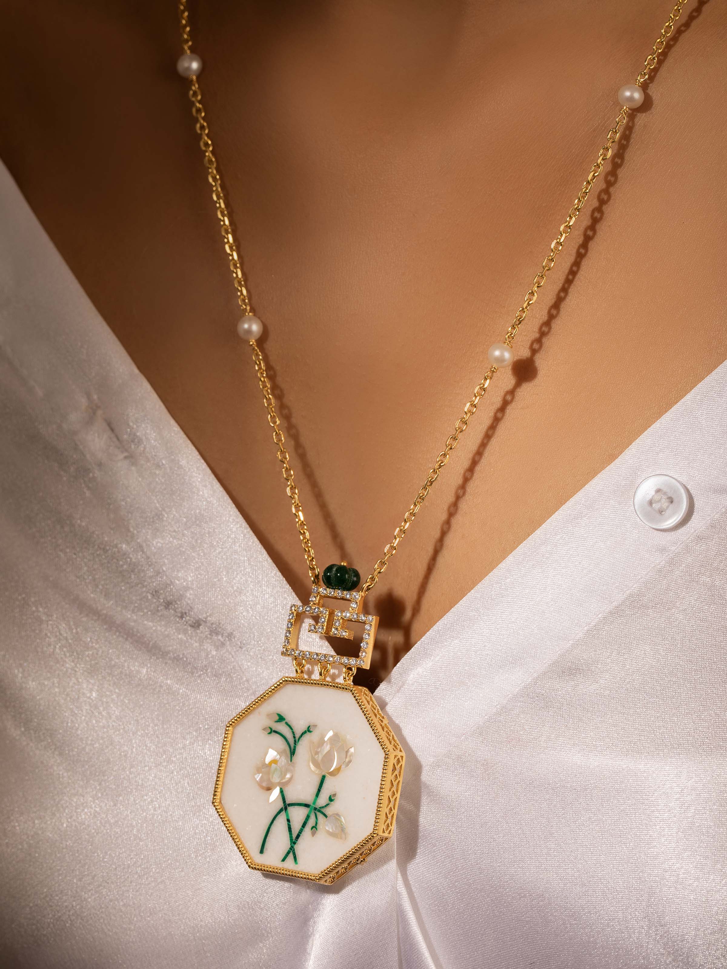 Alternate lifestyle shot capturing pendant details in natural lighting