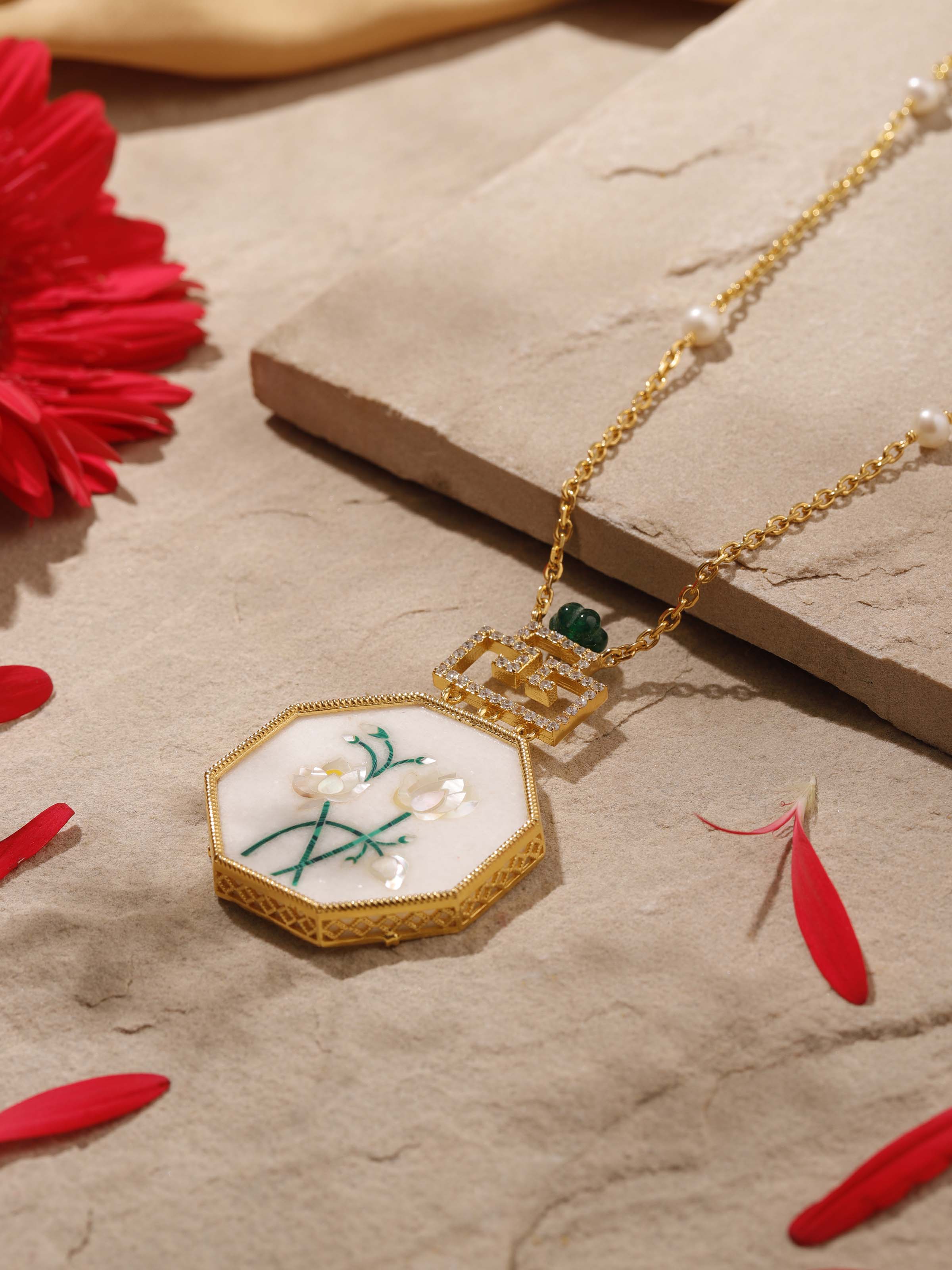 Overhead view of pendant and chain showing symmetrical design