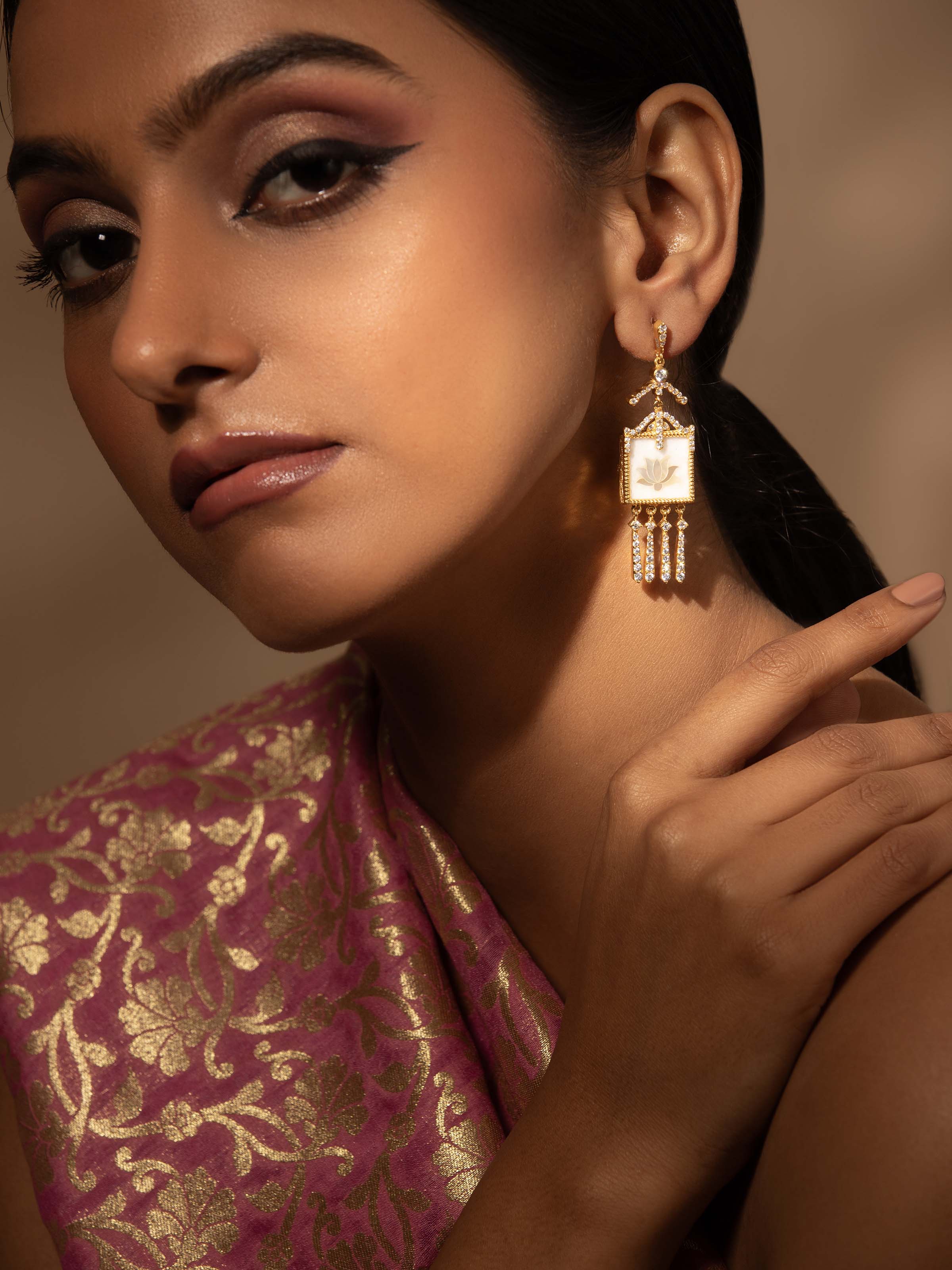 Close-up of Pacchikari Silver Drop Earrings highlighting the detailed craftsmanship and vibrant colors.