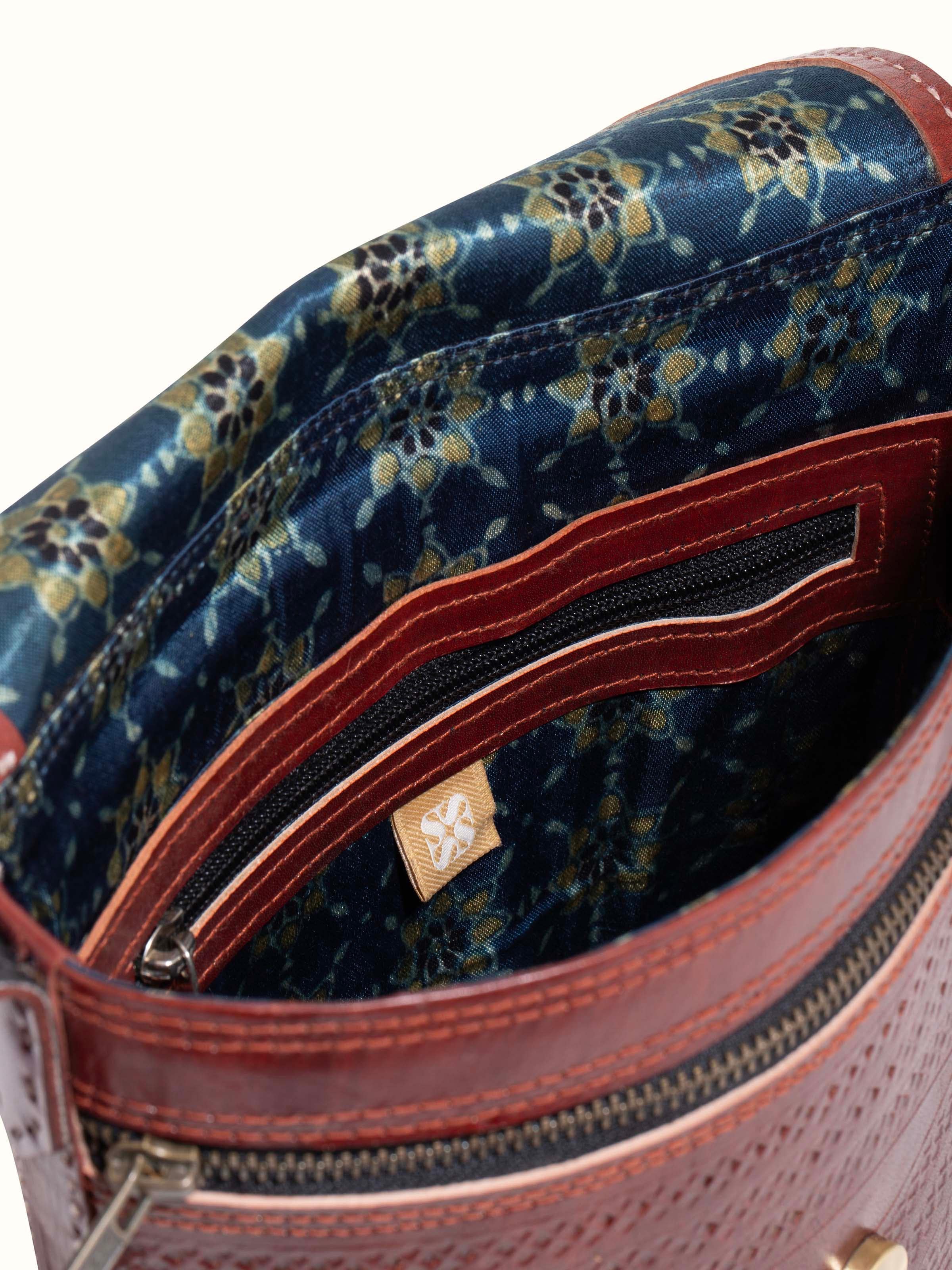 Top view of Kutchi Leather Embroidered Sling Bag displaying the design and material quality.