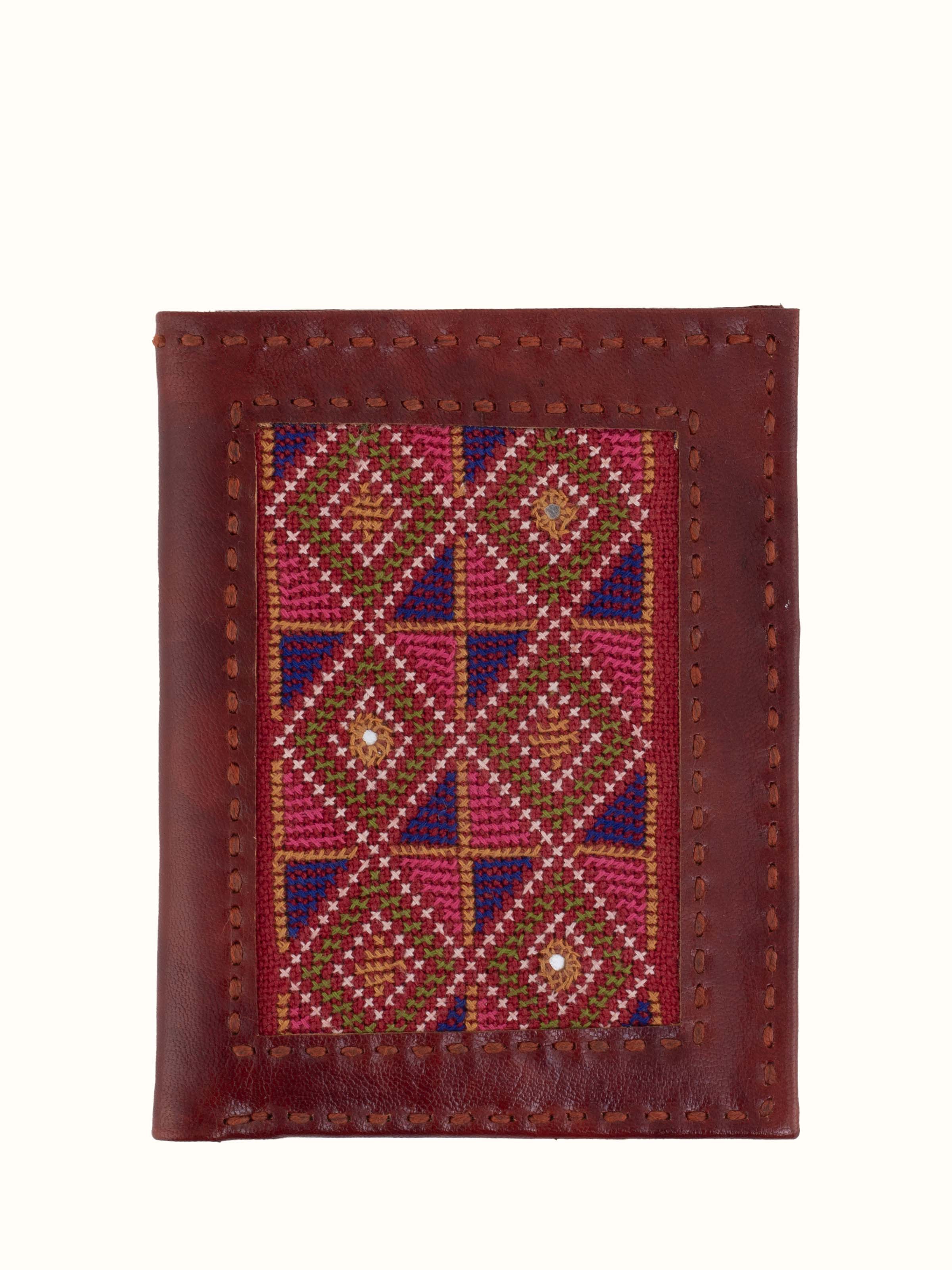 Front view of tan Kutchi leather embroidered wallet showcasing intricate embroidery and rich leather texture