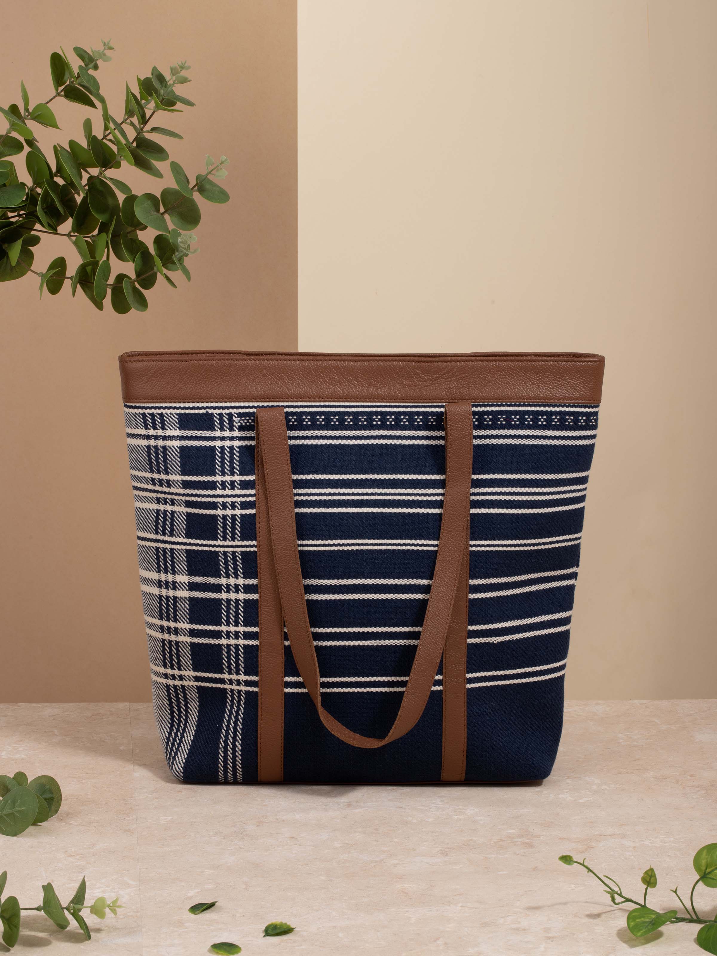 Side view of Leather & Textile Extra-Weft Tote Bag highlighting the texture and design.